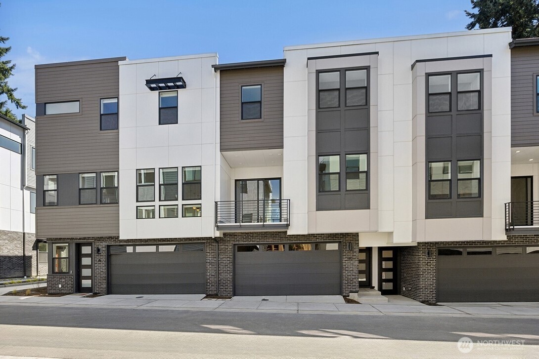 Welcome to Arborstone—where boutique townhome living meets the heart of Bothell! This thoughtfully designed community offers a prime walkable location near shopping, dining, parks, and more. Plan 1 is the ideal place to call home, featuring a flexible lower-level den or office with an attached powder room, a spacious open-concept main floor with soaring 10-foot ceilings, and abundant natural light throughout. The chef’s kitchen impresses with double-stacked cabinets, Jenn Aire appliances and sleek designer finishes. Modern conveniences include integrated smart home tech and a two-bay garage with EV charging. Don’t miss your chance to live beautifully at Arborstone. *Broker must accompany buyer on first visit. Site registration policy #4675.