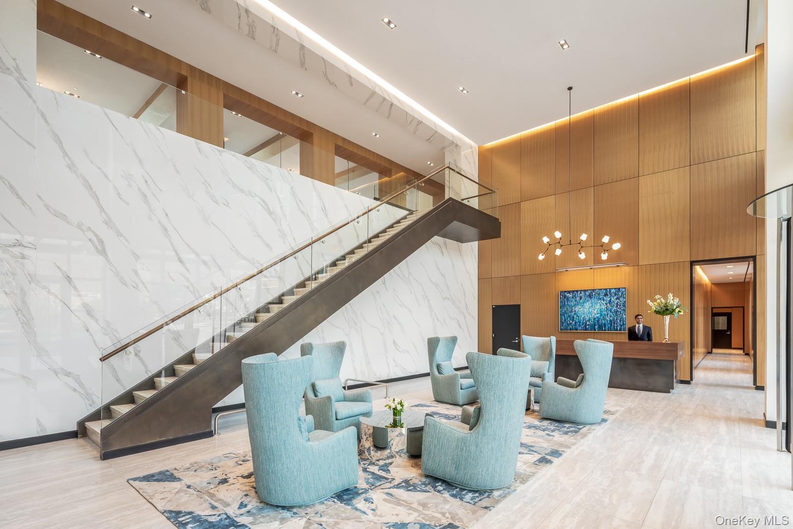 GLEN COVE. Luxury living at its finest, within the Beacon at Garvies Point; nestled on 56 acres of waterfront, residence 1324, is an exquisite 3 bedroom, 3 full bathroom home. The open gourmet kitchen has white Brazilian quartzite countertops and a kitchen island with a Kohler under-mount sink, Sharp easy touch drawer style microwave and Insinkerator garbage disposal. A GE Monogram 6 burner gas range is equipped with dual infrared cooking and is fully vented. The spacious primary king-sized bedroom features an en-suite 5-fixture master bathroom with white marble floors, countertops and full height porcelain tiled walls, a soaking tub and glass enclosed shower and a double vanity with all Kohler fixtures. This home is an entertainer's dream with a private patio as well as all the amenities and comfort the Beacon has to offer; paths, courts, marinas, beaches, dog parks, and much more!