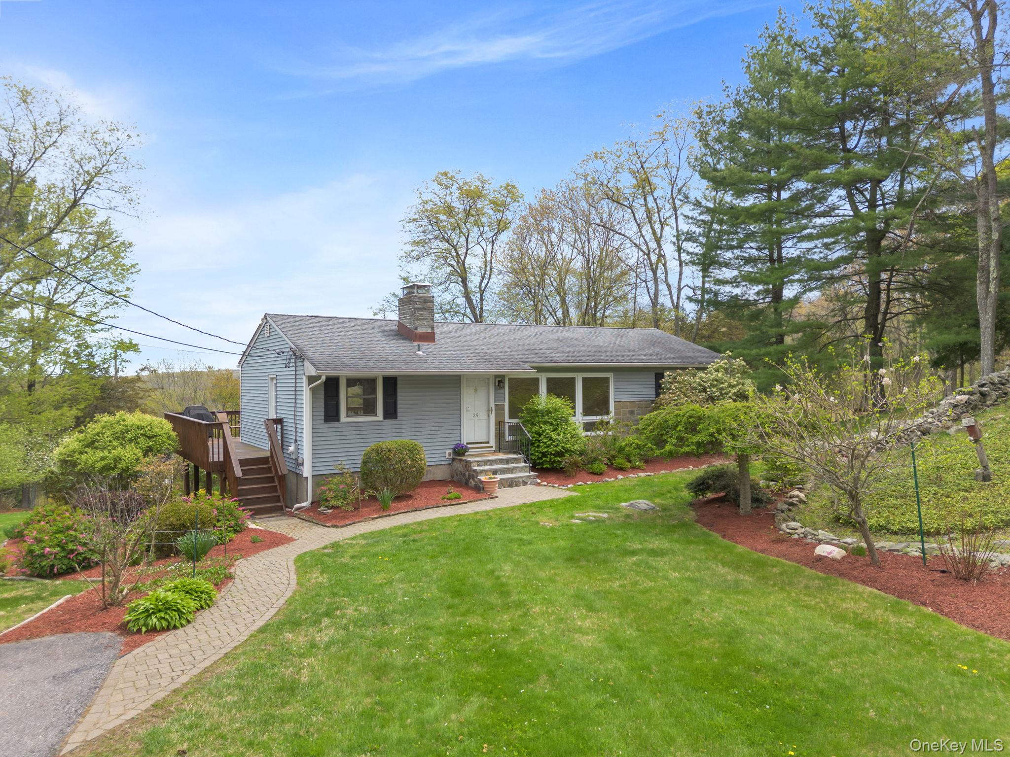 Charming 3-bedroom, 1-bath ranch set on over an acre in the peaceful countryside of North Salem, NY. This inviting home offers the ease of single-level living, surrounded by natural beauty and open space. Step outside onto the expansive deck—perfect for entertaining or unwinding—while taking in sweeping horse country views.  Just a 10-minute drive brings you to downtown Ridgefield, CT, where you’ll find shopping, dining, and local amenities, while nearby highway access (10 minutes to I-84) makes commuting simple. Enjoy the best of both worlds with a scenic, private setting that’s still only about an hour from New York City. A rare opportunity to own a serene retreat with accessibility and charm.