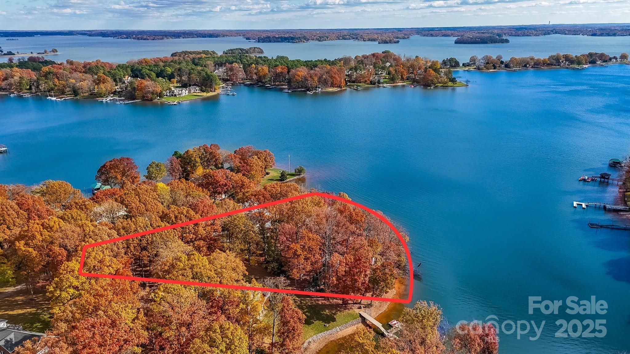 Lakefront Paradise Awaits on Lake Norman! Discover a rare gem on the exclusive Brawley Peninsula, where tranquility meets the pinnacle of lakeside luxury. This .77-acre wooded haven, located off the prestigious Tuskarora Trail, offers over 340 feet of shoreline w/year-round deep water, providing direct access to the shimmering beauty of Lake Norman's Main Channel.  Imagine waking up to sweeping lake views, with the privacy & serenity of a secluded, end-of-road location. Free from HOA restrictions, this pristine property presents an unmatched canvas for creating your dream luxury lakeside retreat. Seize this unique opportunity to own one of Lake Norman’s most sought-after lakefront properties. Amazing opportunity! Hurry on this one!