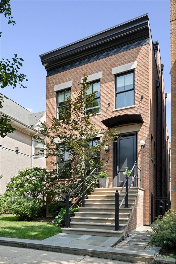 Situated on one of the most desirable blocks in the Southport Corridor, 3509 N Janssen is a sophisticated residence that combines timeless design with exceptional craftsmanship.  Flooded with natural light, this five-bedroom, four-and-a-half-bath home showcases custom millwork, rich detailing, and premium finishes throughout. At its center is a thoughtfully designed chef's kitchen, anchored by a substantial island and a built-in banquette for everyday dining. Ample cabinetry, a coffee and bar station with Sub-Zero wine storage and beverage drawers, and professional-grade appliances-make the space both functional and refined.   The primary suite offers a serene retreat with a spacious walk-in closet and spa-inspired bath featuring a Victoria & Albert freestanding soaking tub, oversized steam shower with rain head, heated floors, and dual custom vanities. Two additional bedrooms and a full laundry room complete the second floor.  The penthouse level provides flexible living with a large family room (or office), wet bar, and access to front and rear roof decks. The lower level includes two bedrooms, a generous recreation room with wet bar, a second laundry room, and a mudroom with custom storage.  Additional highlights include an oversized gas / wood-burning fireplace, radiant heated basement floors, and multiple outdoor spaces designed for entertaining-a built in bbq on the main level patio and a garage rooftop deck with a pergola.  Located in the heart of the Southport Corridor, the home offers unmatched access to boutique shopping, acclaimed restaurants, neighborhood parks, and the Southport Brown Line. 3509 N Janssen delivers the ideal balance of luxury, comfort, and location.