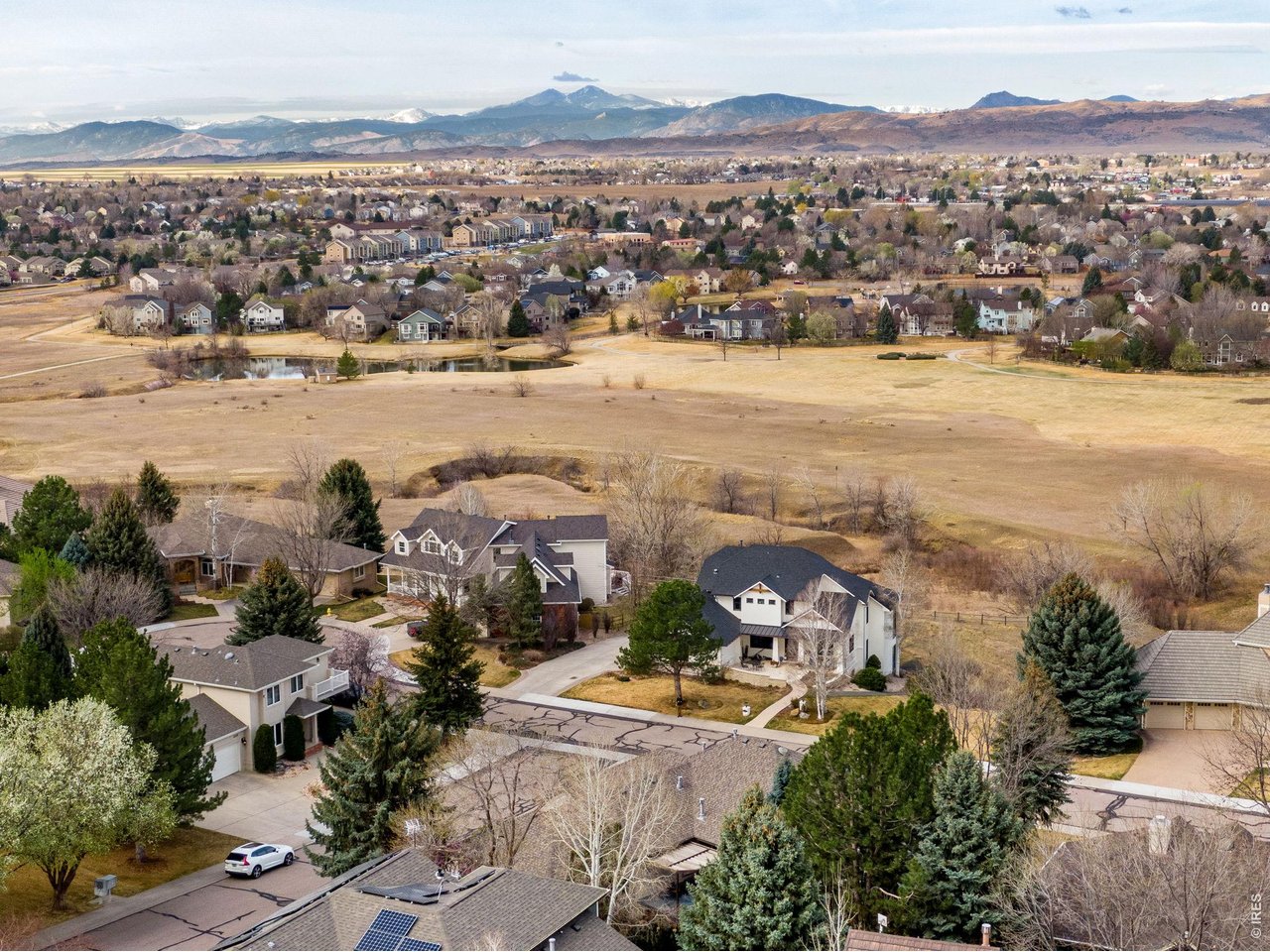 Nestled in the quiet Paragon Point neighborhood, this quality ranch style home is not to be missed. Overlooking the beautiful foothills and Horsetooth Rock, this home captures the best of Colorado from every angle. Well placed windows and deck capture these beautiful views. Walkout basement creates amazing natural light in the lower level. Spacious kitchen with ample cabinets, counterspace and walk in pantry. Three fireplaces, custom woodwork, built in shelving are just a few of the custom details of the home. Large corner lot, 3 Car Garage and large backyard! Steps away from the Power Trail, Golf, Parks and Open Spaces!