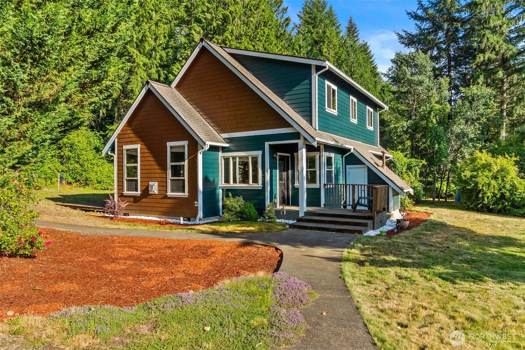 Welcome to your own private Northwest retreat! Within walking distance of the Cowlitz river, Nestled on over 5 peaceful acres in Toledo, this custom-built home offers the perfect blend of privacy, comfort, and natural beauty. Enjoy stunning territorial, lake, and mountain views from the expansive decks while surrounded by mature trees and abundant wildlife. Inside, you'll find soaring vaulted ceilings, hardwood floors, a spacious gourmet kitchen with granite countertops, and a desirable main-level primary suite with a luxurious ensuite bath. The impressive detached shop with its own heated bonus room and ¾ bath offers endless possibilities for hobbies, guests, a home office, or additional workspace. With RV parking, central A/C, a heat pump, wired generator hookup, and room to roam, this is Pacific Northwest living at its finest.