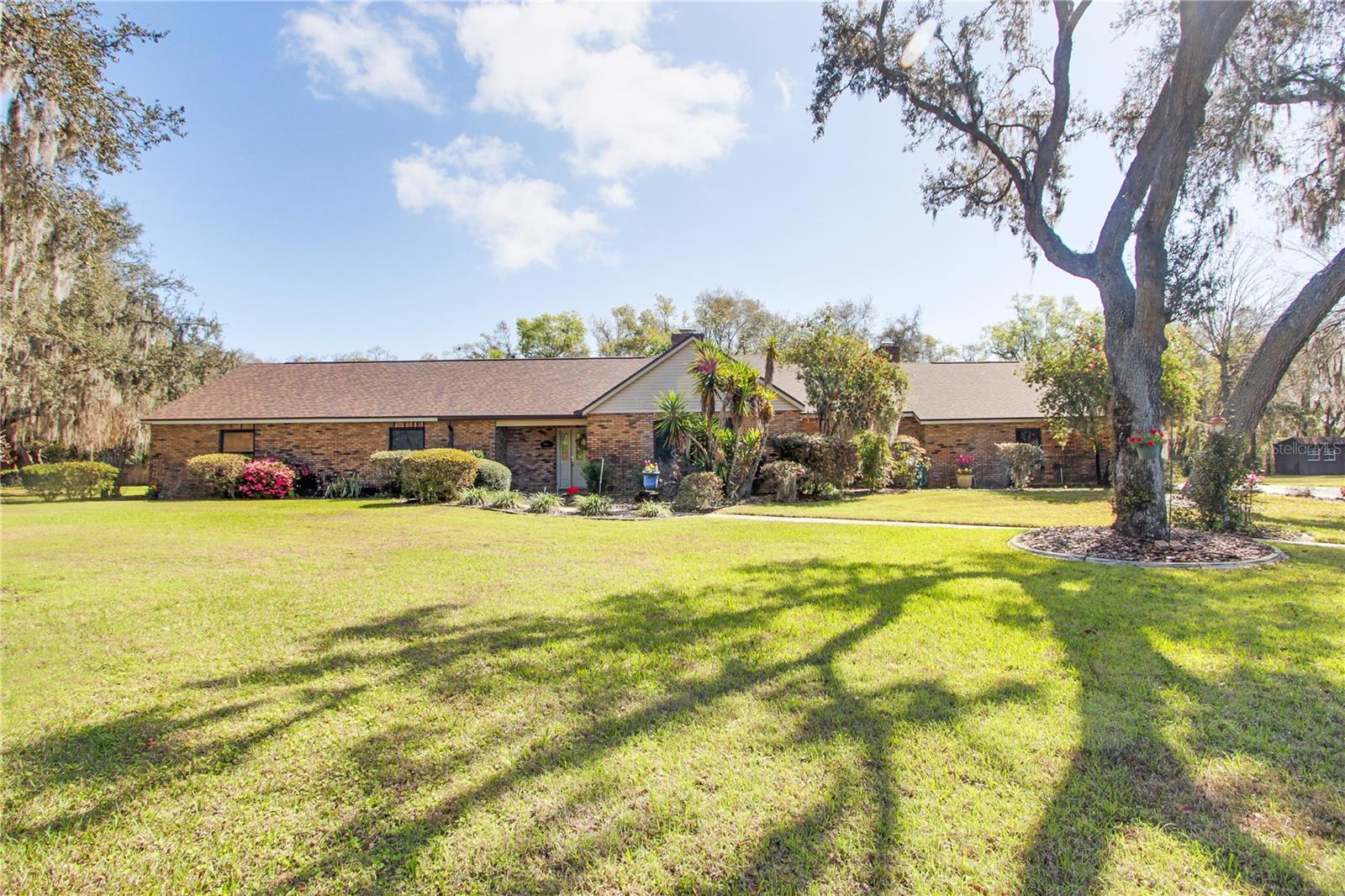 Under contract-accepting backup offers. One or more photo(s) has been virtually staged. Move-in ready 4 Bdrm/2 Bath brick pool home located on a 1.06-acre cul-de-sac lot in desirable Lake UnityVillage. Offering 3,051 Sq Ft of living space, this well-maintained home features both an openliving/dining/kitchen great room and a separate family room, each with its own wood-burning fireplace. Thegourmet kitchen has been upgraded with granite countertops, a granite island with cooktop and vent hood,stainless steel double ovens, a brand-new French door refrigerator, and a custom-built pantry. Sliding glassdoors lead to a spacious, partially covered pool deck with a birdcage enclosure that was recently re-screened(2025). Pool pump and filter tank replaced in 2023. Three generous guest bedrooms provide comfortableaccommodations and lead to the expansive primary suite, featuring its own screened lanai (2025). The en-suite bath offers dual walk-in closets, an updated walk-in shower, a new soaking tub, and quartz countertopscompleted in 2025. Significant recent improvements include a new roof (2025), two new HVAC systems(2024), a new well and pressure tank (2024) while retaining the original operational well for irrigation, water heater (2015), and double-pane Pella windows installed in 2009. A spacious three-car garage providesample storage and parking. Situated in a friendly, private neighborhood while remaining convenient toshopping, dining, and everyday amenities, this property offers space, functionality, and peace of mind withmajor system updates already completed. Don’t miss your opportunity—schedule your private showingtoday before it’s gone!