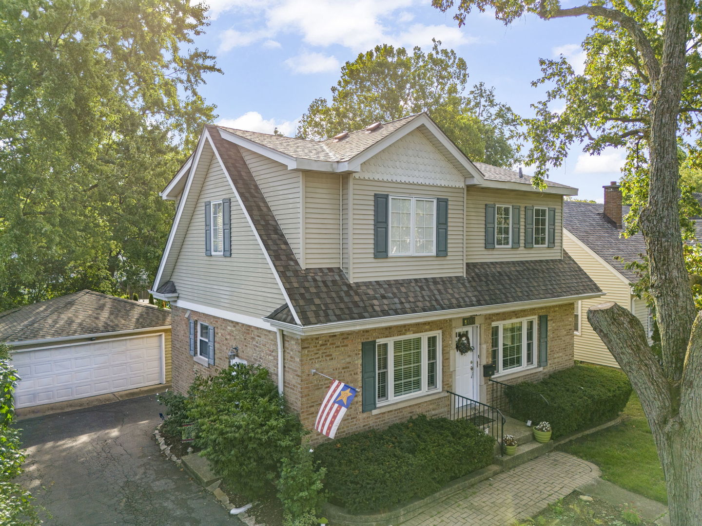 Welcome to 1115 N Main Street in Wheaton, where space, style, and walkable convenience come together in the heart of Wheaton!  Discover the perfect blend of location and updated living spaces, featuring 4 spacious bedrooms and 3.5 bathrooms including a full primary suite with balcony, a first floor bedroom and first floor FULL bathroom! This beautiful home boasts a recently updated kitchen (2025) with new appliances and large island, designed for everyday living and entertaining.  You'll also love the hardwood floors, large bedrooms and living spaces throughout the home. The fully finished basement offers additional living space with 1/2 bath, ideal for a home office, gym, rec room or whatever you need!  Unwind and entertain in the backyard with large patio!  Whether you're working from home, hosting friends, or simply enjoying a quiet night in, this home delivers comfort and versatility at every turn!  Experience living in the heart of Wheaton while walking to all three award winning District 200 schools as well as Northside Park, Illinois Prairie Path, and thriving downtown Wheaton.  Welcome home!