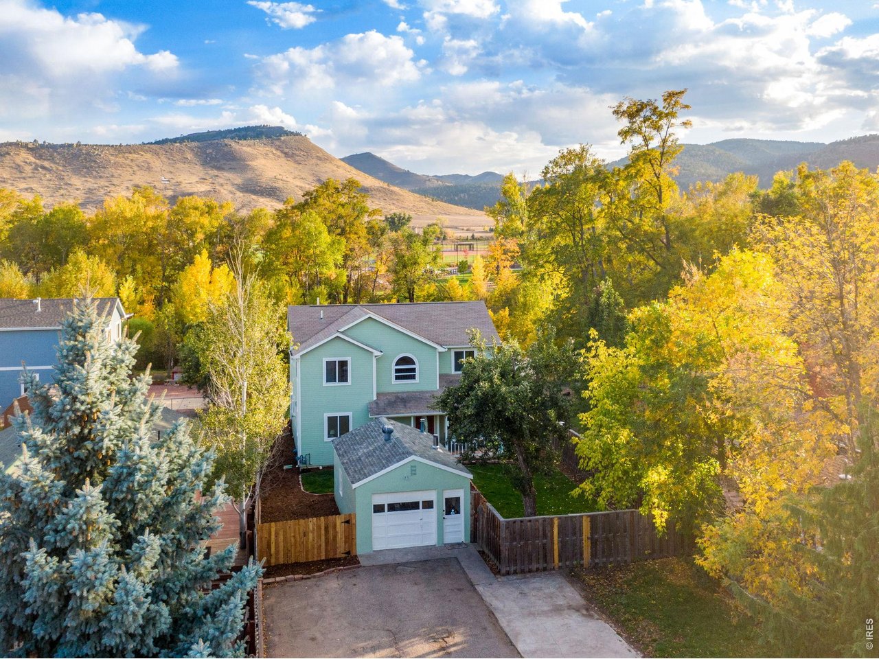 This completely renovated (2024) home is situated on a huge 1/3+ acre lot right at the confluence of the North and South St. Vrain rivers in old town Lyons - pure magic! Sunny and bright design features an open floor plan, main floor study, spacious 2nd floor primary suite with sitting area (not incl. in room dimension), + lots of south facing windows! Large back deck overlooking the yard and river; A rare opportunity to enjoy the river flowing adjacent to your backyard! Property crosses the river and adjoins Bohn Park.