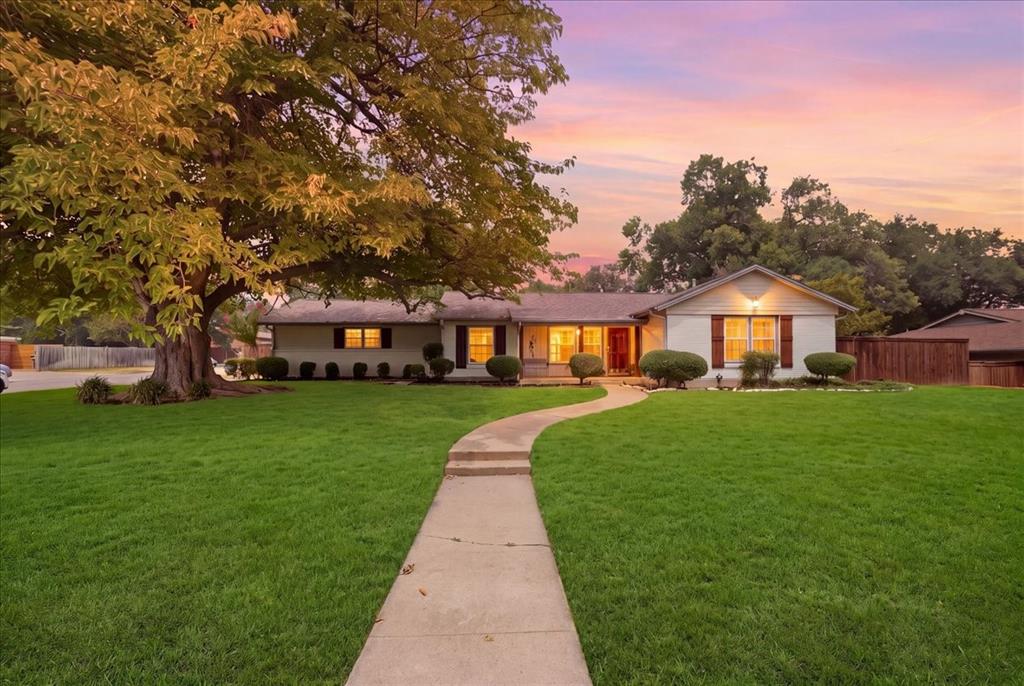 Set in the heart of sought-after Ridglea Hills, this charming 3-bedroom, 2-bath ranch-style home offers 1,612 square feet of comfortable living space on a desirable corner lot. Built in 1957, the home blends classic character with thoughtful updates, including fresh neutral paint throughout and laminate wood flooring with no carpet. The spacious layout offers flexibility for everyday living, entertaining, and a variety of lifestyles.The oversized backyard is a standout feature, offering plenty of room to play, garden, entertain, or simply enjoy the mature trees and privacy. An extended patio with pergola creates the perfect setting for outdoor dining and weekend gatherings. The charming two-car garage adds versatility with epoxy flooring plus a dedicated split AC and heating system, making it an ideal space for a workshop, hobby area, or additional storage.Just around the corner from the neighborhood park, this well-located home offers the established charm of Ridglea Hills with convenient access to shopping, dining, schools, and Fort Worth’s premier amenities. A wonderful opportunity to own a spacious, move-in-ready home in one of Fort Worth’s most desirable neighborhoods.