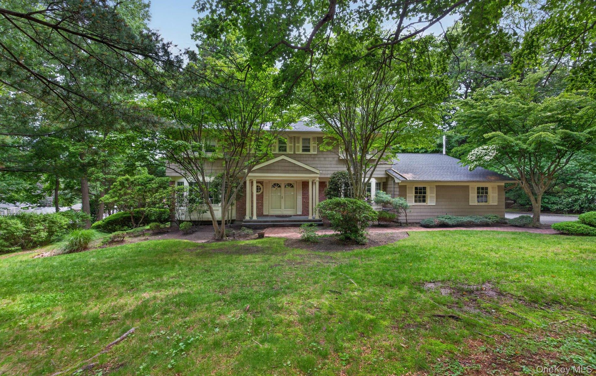 Perfectly positioned on a coveted mid-block location within The Gates of Woodbury, this impressive Center Hall Colonial is set on a beautifully manicured one-acre property and offers an exceptional blend of space, comfort, and timeless design. Thoughtfully crafted for both everyday living and entertaining, the home features generously proportioned rooms, a classic and highly functional floor plan, and seamless flow throughout.A full basement provides abundant storage and potential for additional living or recreational space, and the attached two-car garage adds everyday convenience.Located within the Syosset School District
