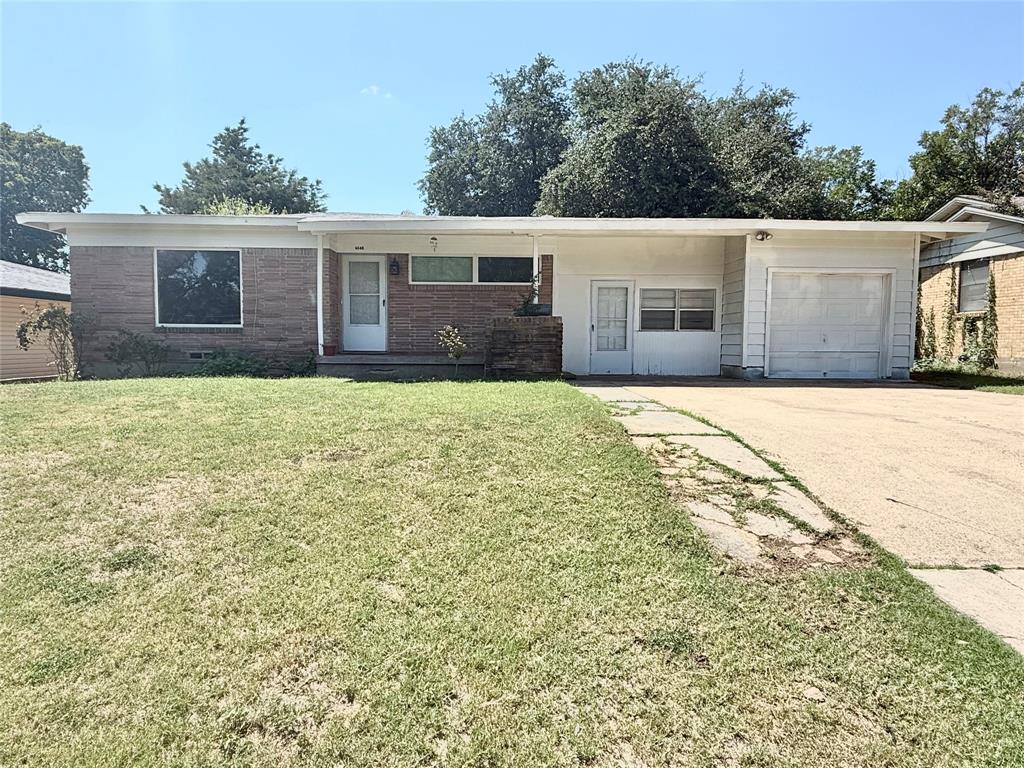 Home needing a little TLC to make it your own. With a large fenced back yard, there's plenty of room for play or entertaining. The Shade trees help will help keep it a little cooler too. The house features three bedrooms and one bathroom. There is a one car garage with an enclosed breezway and bonus room between the garage and house.  This is a great opportunity for a little work and paint to make it your own and build up some equity.