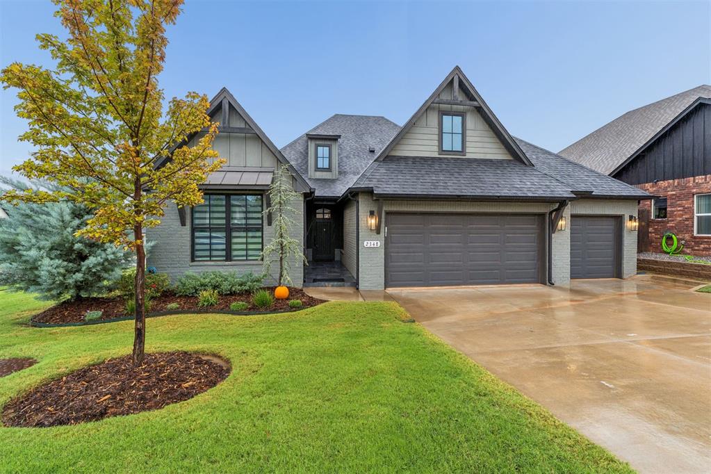 Quality stands out the moment you arrive. Thoughtfully upgraded beyond specifications, this meticulously maintained residence offers the finishes, functionality, and attention to detail rarely found in comparable construction. Located on a beautifully landscaped corner lot within the gated Preserve at Covell Valley, the open-concept floor plan showcases engineered hardwood flooring, designer lighting, carefully selected tile and countertops, and abundant natural light. The spacious kitchen features upgraded countertops, deep farm sink, a gas cooktop, oversized island, generous prep space, and extensive cabinetry. The private primary suite features dual vanities, a soaking tub, walk-in shower, and an oversized walk-in closet with direct access to the laundry room. A dedicated study offers flexibility for a home office, quiet retreat, or playroom, while two additional bedrooms share a well-appointed hall bath. Outside, the professionally landscaped backyard features an extended patio with a retractable sunshade and an iron fence with privacy screening. Additional highlights include custom window shades, designer lighting on dimmers, storm shelter, epoxy garage floor, EV charging outlet, wrought iron fence, and tiled exterior front walk. HOA plans include a future neighborhood pool and recreation facility. The exciting growing Covell and Sooner Road corridor offers convenient access to shopping, dining, medical services, and everyday essentials. A new elementary school (fall of 2026) and middle school (fall of 2028).