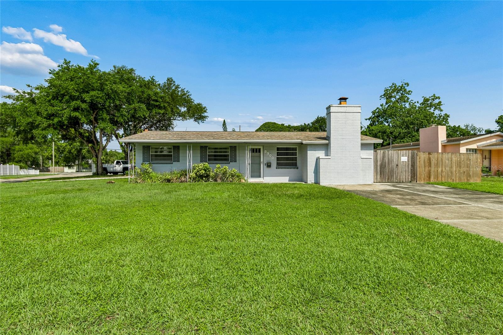 Virtually Staged. Welcome to this charming 3-bedroom, 1-bathroom home offering 1,136 square feet of living space in the heart of Pinellas Park! Situated on a spacious corner lot, this property provides plenty of outdoor space, including a fenced side yard that's perfect for pets, gardening, or entertaining, along with a screened-in back porch where you can relax and enjoy Florida living year-round. The home features a new shingle roof installed in 2022 with durable peel-and-stick underlayment, providing added peace of mind for years to come. Conveniently located less than 20 minutes from Tampa International Airport, the beautiful Gulf beaches, and the vibrant dining, shopping, and nightlife of downtown St. Petersburg, you'll enjoy easy access to everything the area has available. Outdoor enthusiasts will appreciate being just one mile from Lloyd Tingler Park. With NO HOA, this property offers flexibility and endless potential for buyers looking to personalize a home and create their dream space. Whether you're a first-time homebuyer, investor, or someone ready to make a home your own, this is an incredible opportunity in a great community!