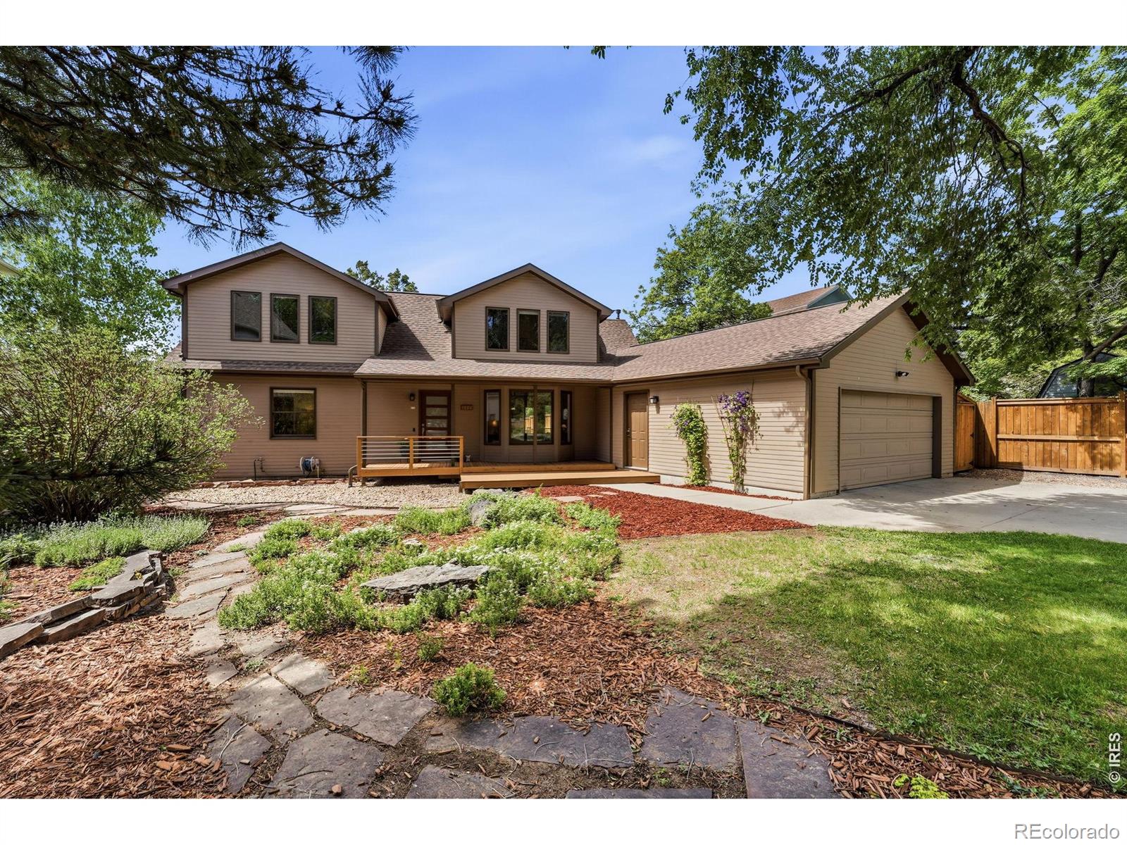 Welcome to coveted North Boulder. Home is nestled between Wonderland Lake Trailhead & Crestview Park/School, this meticulously maintained gem delivers the open, light-filled lifestyle with quality & comfort. The heart of the home is a timeless Melton-crafted kitchen flowing into a generous open floor plan anchored by large picture windows & warm wood floors throughout. Vaulted ceilings in the family room & two covered decks - front and back - transcend the line between indoor & outdoor living. The layout is as functional as it is beautiful: 5 bed (3 up / 2 main), 3 baths, & 2-car attached garage. Upstairs, three vaulted-ceiling bedrooms include a sweeping primary suite with sitting area, 5-piece bath, & walk-in closet. Seasonal mountain views. Backyard offers privacy, space, gardens, & 80 SqFt studio shed. Trail access to amenities & multiple open spaces & parks literally in every direction. Owned PV solar system too!