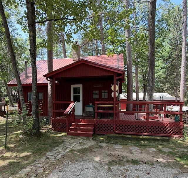 Escape to the peace and charm of forest living with this beautiful cabin nestled near the serene Au Sable River. A true northern retreat, this property offers the perfect outdoor lifestyle, whether it's morning coffee with the sound of nature or evening bonfires under the stars. Ideal for Buyers seeking a private getaway or full-time up-north Living. Schedule your showing today before this Home is gone!