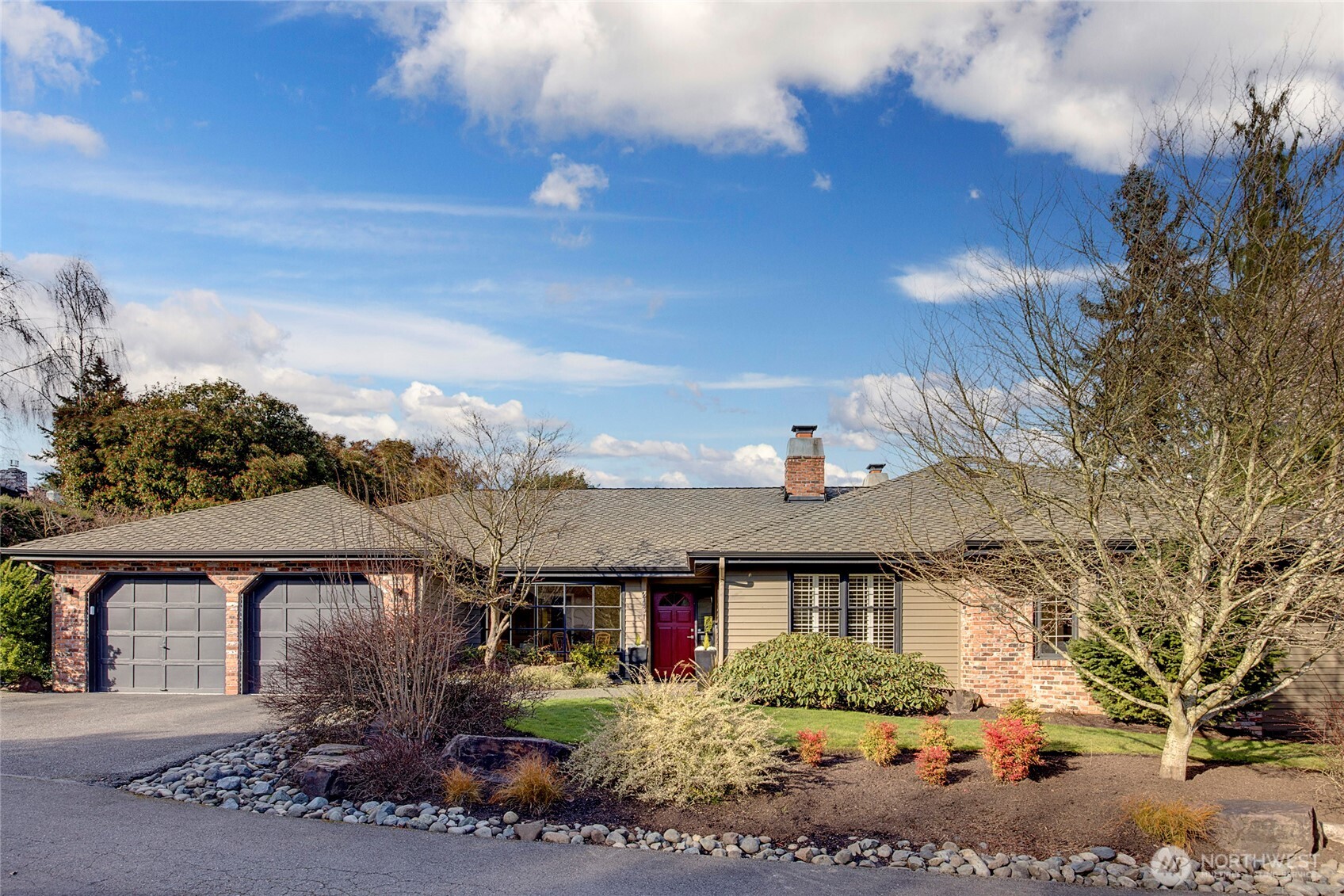 Impeccable one level living defines this charming and beautifully updated home. Thoughtfully upgraded and meticulously maintained, it reflects an extraordinary pride of ownership throughout. The chef’s kitchen features a classic color palette, slab quartz countertops and stainless steel appliances, and both the kitchen and baths have been completely remodeled with timeless finishes and quality craftsmanship. Refinished hardwood floors, new systems and careful attention to every detail create a home that feels polished and truly move in ready. Two fireplaces add warmth and character, creating inviting spaces for gathering and relaxing. An additional finished room offers wonderful flexibility, perfect for a work from home office, craft room, bonus space or exercise studio. The layout provides all the right spaces for comfortable everyday living and easy entertaining, filled with natural light and a seamless flow from room to room. Set on a level lot, the yard is just enough to enjoy outdoor living, gardening or play without overwhelming upkeep. Tucked down a private lane on the coveted north end of Mercer Island, this special setting offers rare privacy with exceptional convenience, just moments to Luther Burbank Park’s waterfront, trails and open space and within walking distance to Mercer Island Town Center and the new light rail.