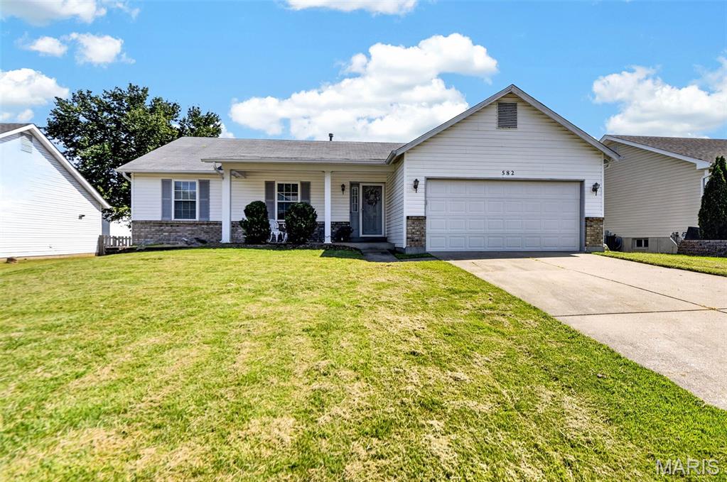 New Home. New Beginnings. New Memories!Welcome home to this lovely ranch offering approximately 1,438 sq. ft. of above-grade living space, featuring 3 bedrooms, 2 full baths, a large family room, spacious kitchen/breakfast room, partially finished lower level, and an attached 2-car garage.Step inside and you'll immediately appreciate the fresh, move-in-ready feel. The entire main floor has been freshly painted, including the stairs to the lower level, with the ceilings in the vaulted family room and kitchen also refreshed. All three bedrooms feature brand-new carpeting installed in 2026, as well as ample closet space and ceiling fans with light kits.The spacious kitchen offers plenty of cabinetry, a designated pantry, electric smooth-top oven/range, dishwasher, and stainless-steel refrigerator. Convenient access to the attached garage makes unloading groceries quick and easy. The adjoining breakfast room is filled with natural light from a large bay window overlooking the backyard.Gather with family and friends in the generously sized family room, which flows seamlessly to the rear yard and spacious deck—perfect for morning coffee, summer barbecues, entertaining, or simply relaxing at home. The fully fenced backyard provides plenty of room for kids, pets, playtime, and outdoor enjoyment.The massive primary suite offers the privacy and space you've been looking for, complete with a private en-suite full bath and two closets, giving everyone room to organize their belongings without compromise.Downstairs, the partially finished lower level provides a huge recreation area and an additional space that could be used as a sleeping area, home office, playroom, or hobby space. You'll also find more than ample storage, giving you plenty of room for seasonal items and everything else you want tucked away.And then there's the location! Enjoy the convenience of being close to just about everything while still feeling tucked away from the hustle and bustle. Restaurants, Home Depot, Lowe's, multiple grocery stores, libraries, Westoff Park, Fort Zumwalt Park, Page Extension, and Highway 70 are all easily accessible, making commuting, errands, recreation, and everyday living a breeze.Don't miss your opportunity to make this well-maintained, freshly updated ranch your new home and start creating memories of your own!