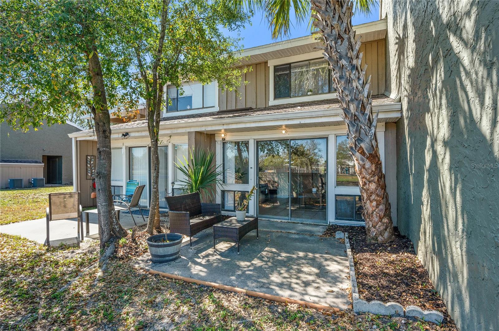 Beautiful 2-Bed, 1.5-Bath Townhome with Water Views in Dr. Phillips!This inviting 2-bedroom, 1.5-bath townhome features a bright living area and dining space, an interior laundry room with washer and dryer, a half bath, and tile flooring throughout the main level. Upstairs, you’ll find two spacious bedrooms with ample closet space and a full bathroom. Relax on your private back patio and take in the lovely water views, perfect for morning coffee or evening downtime. This home can be offered furnished, making it move-in ready and effortless to enjoy.Located in a welcoming neighborhood with top-rated schools nearby, this home is just minutes from Universal Studios, shopping, and dining. Your dedicated parking space adds convenience. A great opportunity for owner-occupiers or those looking to invest.Community Amenities:* Pool* Tennis courts* Clubhouse* Scenic sidewalks and landscaped common areas* Assigned and guest parkingCall to schedule a private viewing today!