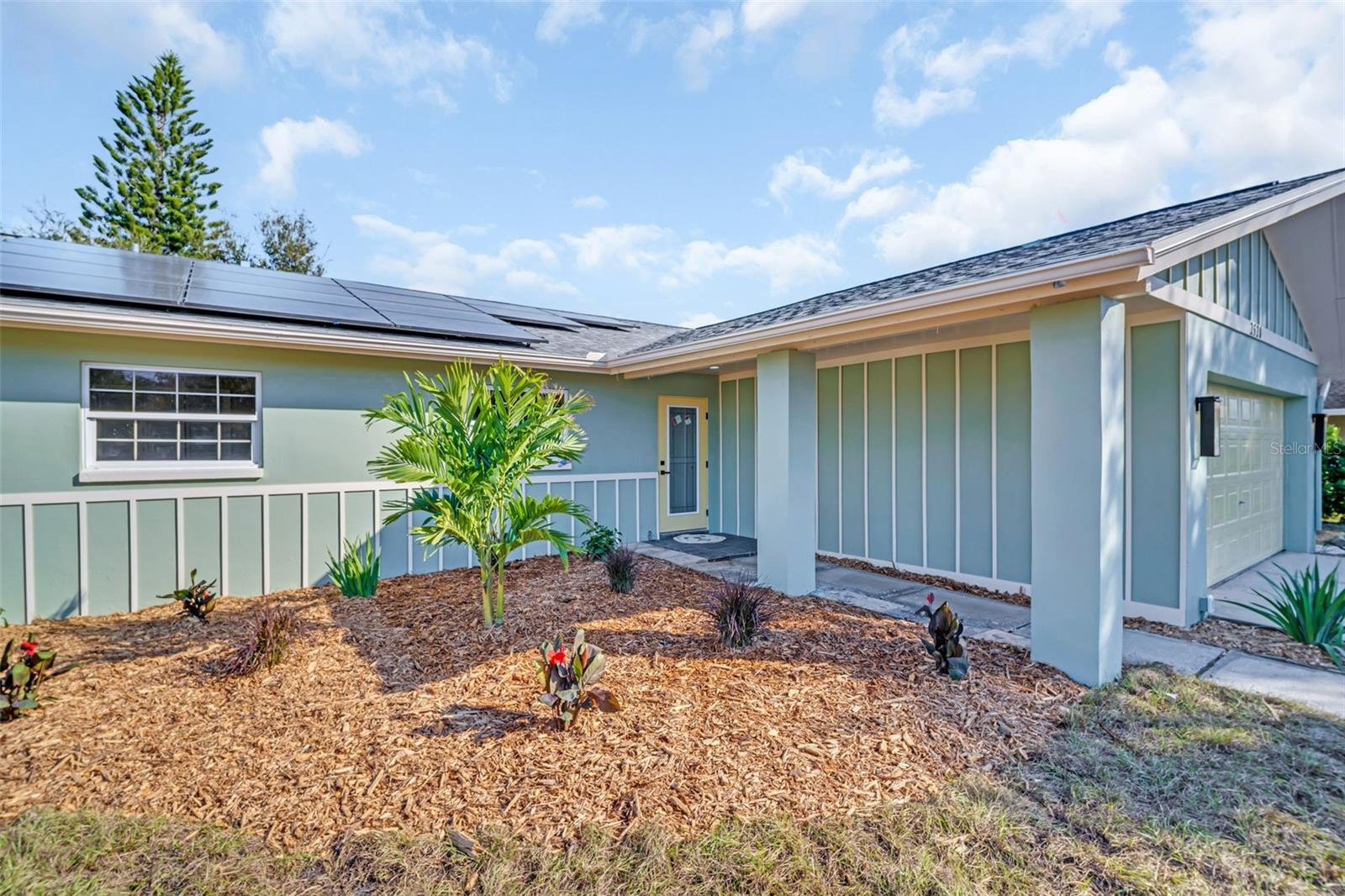 One or more photo(s) has been virtually staged. LOCATION. MOVE IN READY. NON FLOOD ZONE. Welcome home to this fully remodeled Dunedin retreat, a residence where every detail has been thoughtfully crafted for modern living and peace of mind. Tucked away in a NON-flood, NON-evacuation zone with no HOA, this property blends the charm of Dunedin living with the comfort of a completely updated home—leaving nothing for you to do but move right in and enjoy.From the moment you arrive, the curb appeal sets the tone: fresh landscaping, new vinyl fencing, and a clean, contemporary exterior welcome you inside. Step through the new impact-rated doors into a bright and airy interior filled with natural light dancing across the brand-new luxury vinyl plank floors.The heart of the home—the chef’s kitchen—has been fully redesigned with custom cabinetry, new appliances, and a sleek modern layout perfect for daily living or entertaining. The kitchen flows effortlessly into the spacious living areas, giving the home a warm, open feel, with plenty of storage! The split floor plan offers privacy and functionality, with four generous bedrooms and two beautifully updated bathrooms. The primary suite is a true sanctuary, featuring a complete master bath redesign with a luxurious walk-in shower, soaking tub, and elegant fixtures that create a spa-like retreat.Every major system in this home has been replaced, providing unmatched peace of mind. You'll find six new impact windows, all new impact-rated exterior doors, a brand-new high-efficiency Lennox AC system(2025), new water heater(2025), and new blown-in R30 insulation for optimal efficiency. Energy-conscious buyers will love the addition of new solar panels, while the completely new electrical panel (2025), all new electrical fixtures, and fully replaced plumbing and fixtures(2025) ensure modern reliability. Inside and out, everything has been refreshed with new paint, giving the home a crisp, modern feel.Outside, your backyard oasis awaits—perfect for relaxing, entertaining, or enjoying peaceful Florida breezes at any time of day. Don't forget your spacious two car garage with a brand new washer and dryer.And the location simply can’t be beat. You’re minutes from Downtown Dunedin, world-famous beaches, golf courses, parks, schools, hospitals, churches, local shops, restaurants, and the mall—placing the best of coastal living right at your fingertips.Every upgrade. Every detail. Every inch—completely redone. This truly move-in ready Dunedin home delivers comfort, style, and peace of mind in one of Pinellas County’s most treasured communities.