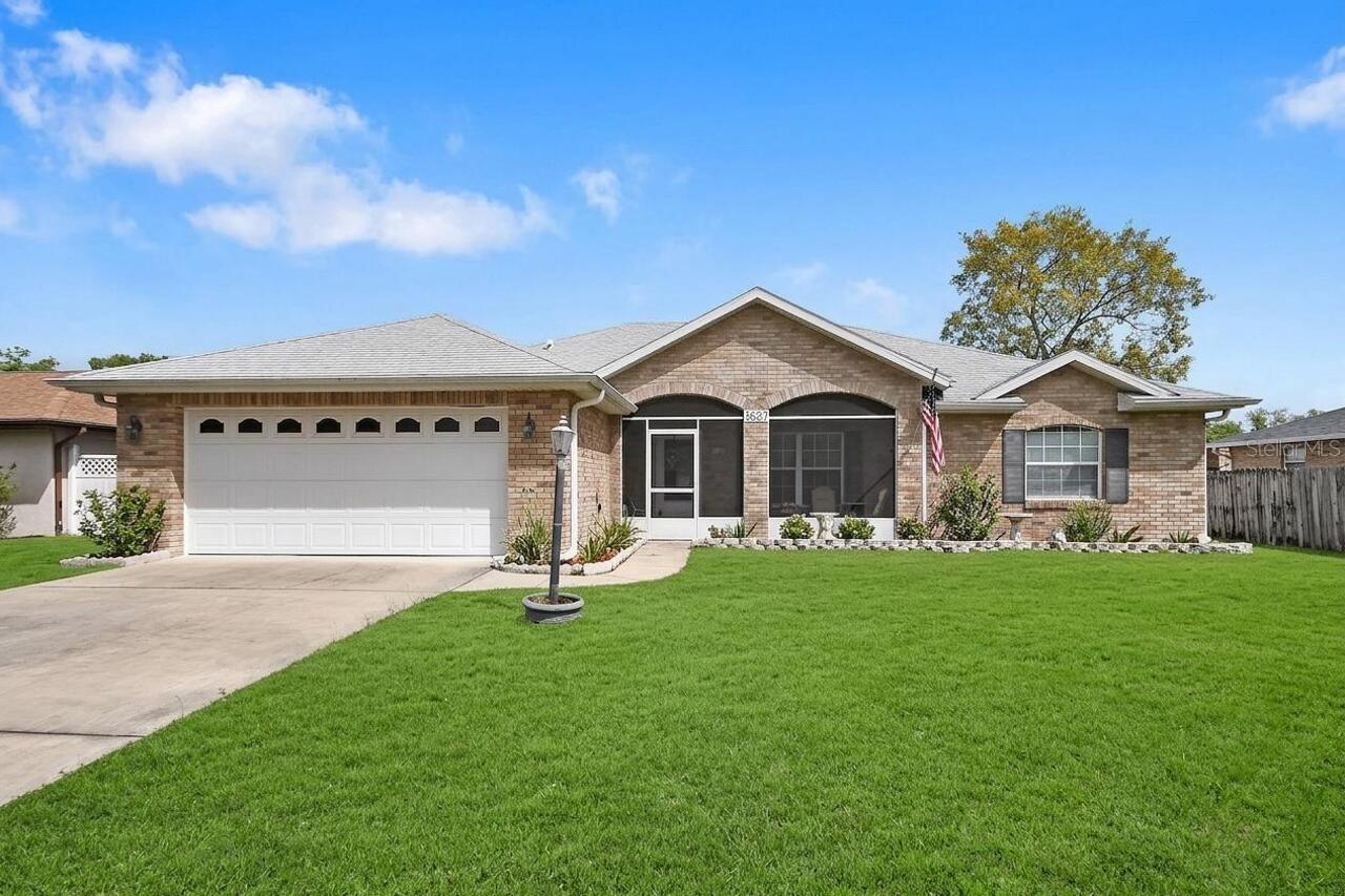 Welcome to this beautiful ALL BRICK POOL home, thoughtfully designed with comfort and functionality in mind. Featuring a desirable split floor plan with 3 bedrooms, 2 baths with NO HOA!, this home offers privacy and space for everyone.Step inside to find ceramic tile throughout the main living areas, a formal living room perfect for welcoming guests, and an open-concept layout ideal for everyday living. The updated kitchen flows seamlessly into the main living space, making it perfect for both entertaining and family gatherings.Enjoy Florida living at its finest in the spacious patio and pool area, complete with solar heating—that has been paid off, perfect for year-round enjoyment and weekend get-togethers. The fully fenced backyard provides both privacy and room to relax or play.ROOF 2023, AC SYSTEM 2023, Solar Panels for pool are paid off.Additional highlights include an indoor laundry room and a two-car garage for convenience and storage. Ideally located with easy access to the Orlando metro area, Daytona Beach, and New Smyrna Beach, this home offers the perfect blend of tranquility and accessibility.