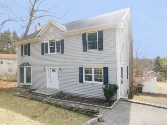 YOU'LL LOVE COMING HOME to this Beautiful colonial...Enjoy luxury living in a suburban area. Kitchen features tumbled marble countertops and tumbled stone flooring. Living room features wood burning fireplace and hardwood flooring.  Lovely formal dining room as well. Step into a gorgeous master suite with vaulted ceilings and bath has tumbled marble in the steam shower.  Many many custom features throughout. STOP RENTING AND THROWING MONEY AWAY AND OWN YOUR OWN HOME AND HAVE A TAX WRITE OFF!