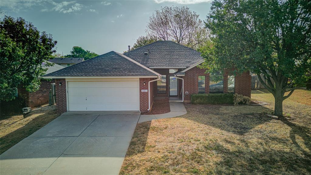 This home features a spacious, open living room, kitchen, and dining area with high ceilings throughout. The living room includes a corner gas fireplace, and the kitchen comes with appliances, including the fridge, and gas stove, lots of cabinets and countertops. The master bedroom offers double sinks, two separate closets, a  skylight, a walk-in glass shower in the bathroom. The backyard is fully fenced with a wood fence and boasts a large, covered patio with a solid roof. Nearby, you’ll find a park, playground, and a lake with walking trails. Plenty of space to enjoy.