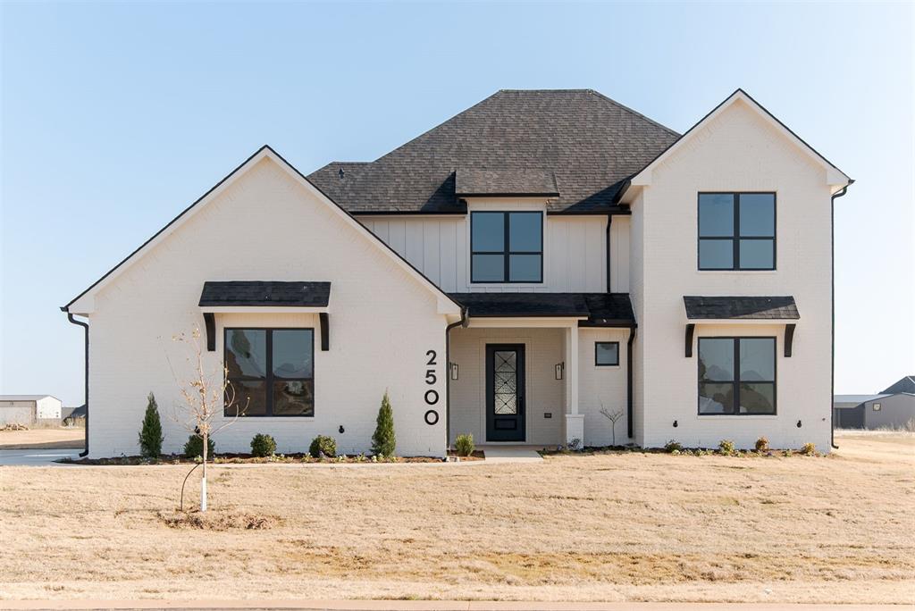 Put down your roots in this beautiful new home situated in the Anton's Landing neighborhood that seeks to preserve Oklahoma's unique legacy with natural features and spacious views. The gated neighborhood also has a shared walking path around the natural wetlands which has invited wildlife for decades. You'll feel like you are living in a dream in this 4 bedroom, 3 bathroom home with attention to each space that fuses design and function. Downstairs has the large living area, modern kitchen, and dining area as well as the primary bedroom and bath, 2nd bedroom and bath and also a mud room. The kitchen is equipped with Kitchen-Aid appliances including a microwave/oven combo + warming drawer, gas cooktop and dishwasher plus a walk-in pantry. The primary bedroom has a gorgeous bathroom with soaker tub and a large walk-in closet that routes back to the laundry room complete with a laundry shoot from upstairs. The upstairs has a balcony separating the two bedrooms, the third bathroom and an additional large bonus room. Other quality details include a storm shelter in the garage, spray foam insulation on all the exterior walls and roof, post-tension foundation, tankless hot water system, quality finishings in all the bathrooms and plenty of storage areas. Don't wait.. schedule your private showing today to tour this real legacy home.