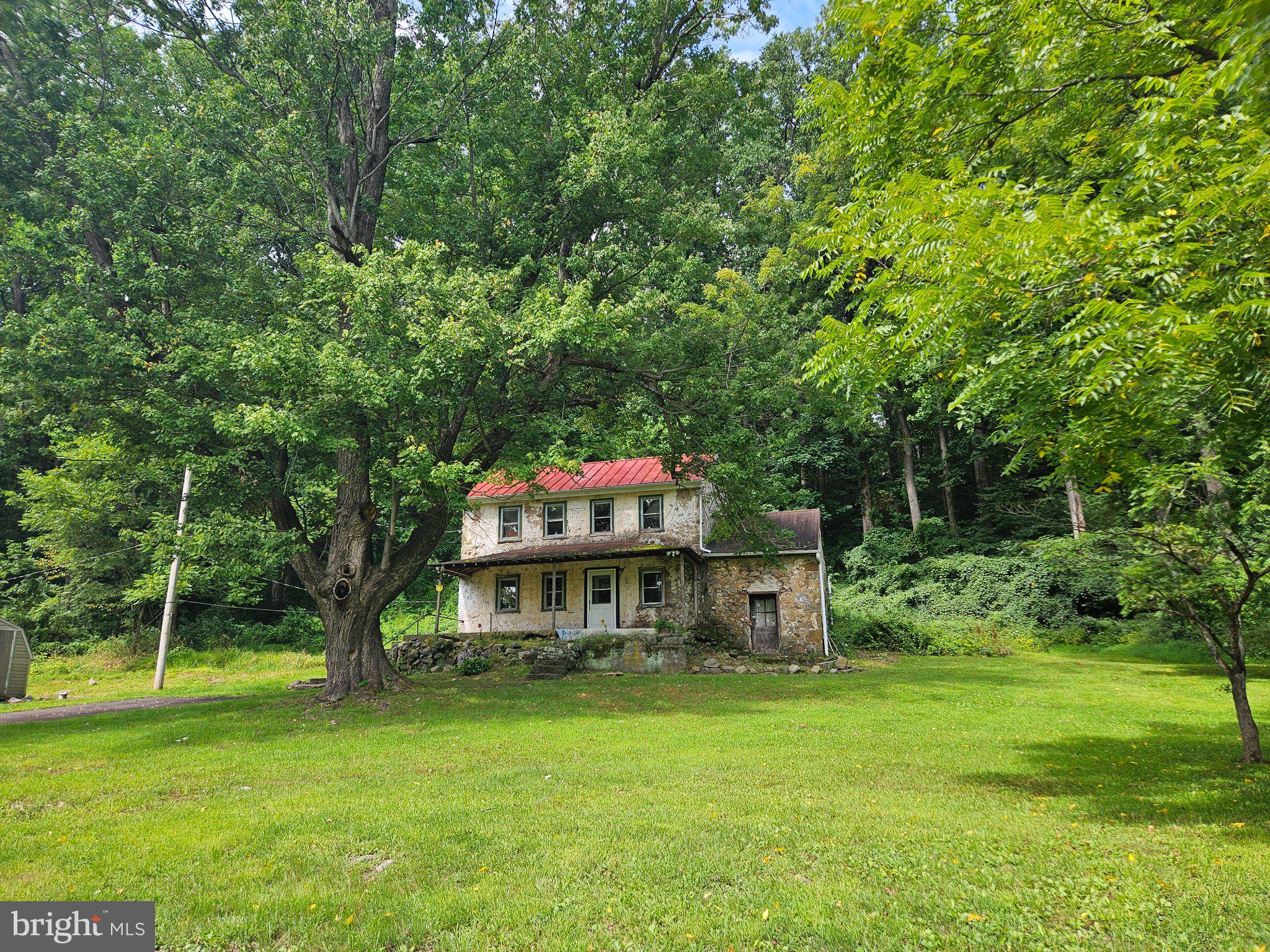 Price reduction! Gorgeous Warwick township, this home borders protected conservation lands, near Hopewell Furnace and French Creek State Park. This stone farmhouse, circa 1780, is awaiting the right buyer to bring it back to it's original glory. In need of total renovation and is being sold in as-is condition. This home is located in a registered historic district. For guidelines, please go to the Warwick Township Chester County website, Historical Commission, Documents Available and Guidelines.