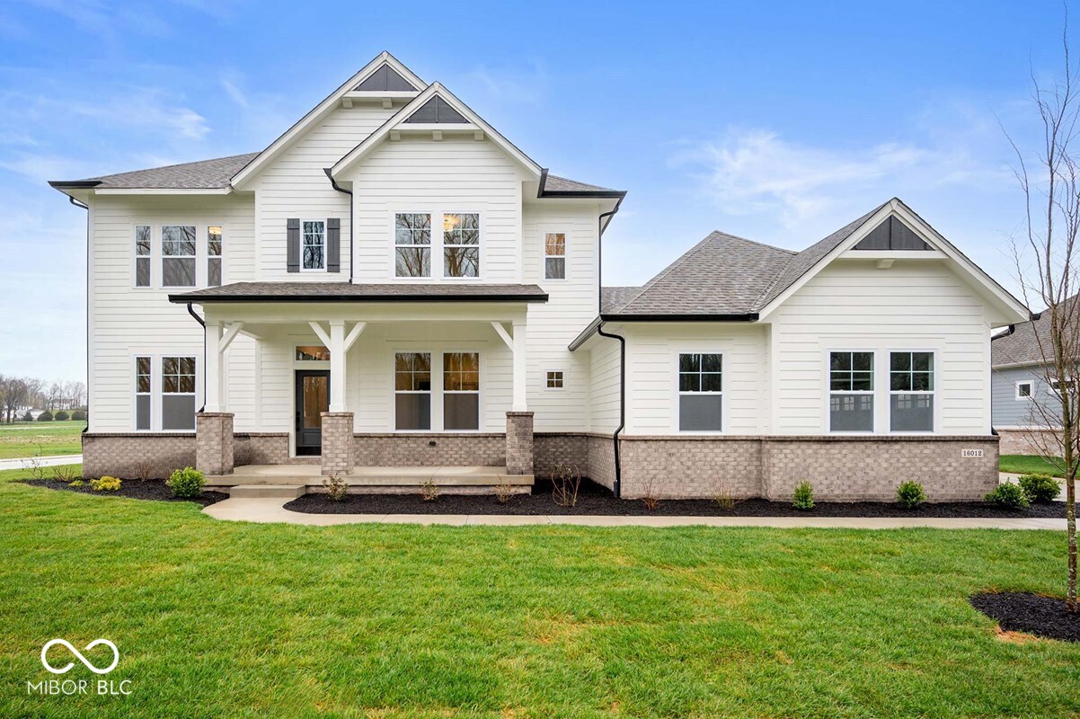 *Photos are of a similar plan, actual home features may vary.  The Wildcat floorplan in Lakes at Grantham offers 4,685 square feet of thoughtfully designed living space on one of the community's premier corner homesites, over 1/3 of an acre. This stunning home includes 5 bedrooms, 5.5 baths, and a finished basement with a spacious game room and full bath.  The main level includes a study, secondary bedroom, luxurious owner's retreat, gourmet kitchen, gas fireplace, and an extended covered porch perfect for outdoor living. Upstairs, you'll find three additional bedrooms and a versatile bonus room. A 3-car garage provides ample storage and convenience.  Located within the highly sought-after Hamilton Southeastern School District, this scenic and nature-focused community features multiple ponds and fountains throughout, paved trails connected to its 42-acre nature preserve, and resort-style amenities including an outdoor pool, indoor basketball and pickleball courts, dog park, fire pit, and community lounge, all with a low $67/month HOA. The community is conveniently located just minutes from Hamilton Town Center and only 11 minutes from downtown Fishers, offering the perfect blend of luxury living, nature and everyday convenience.