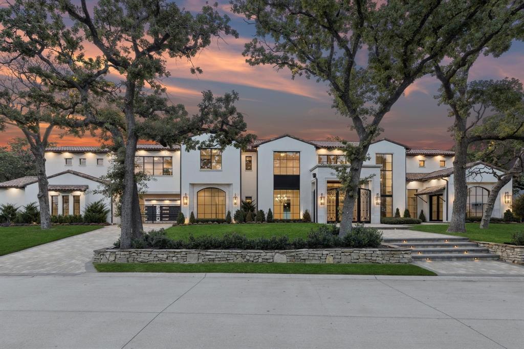 Discover the pinnacle of transitional luxury with this breathtaking custom estate, nestled on a secluded, tree-lined acre in the exclusive Estates of Quail Hollow. Designed to impress and crafted to the highest standards with features like Fine Art Lighting, this exceptional residence seamlessly blends elegance, comfort, and functionality in one of the area’s most coveted enclaves.At the heart of the home lies a showstopping gourmet kitchen, thoughtfully curated for both entertaining and everyday living. Outfitted with state-of-the-art Sub-Zero and Wolf appliances, the space is further enhanced by European-style soft-close cabinetry, two dramatic waterfall islands, and premium finishes throughout.Entertainment abounds on the first floor with both a game room, custom bar with ice maker, beverage refrigerator, and a fully equipped media room.The opulent primary suite is a true haven, adorned with exquisite marble details, two custom-designed closets, and storm shelter. Step outside to your private resort-style sanctuary, where you will find a covered patio, outdoor kitchen with built-in gas grill, pool and spa combo, and sunken fire pit!Differentiating features include a putting green, and a private sports court, perfect for tennis, pickleball, or basketball. This home is completed with a 6-car garage and gated motor court for the discerning car enthusiast! This estate redefines upscale living, offering an unparalleled combination of privacy, prestige, and lifestyle.Welcome home to where luxury meets legacy— Estates of Quail Hollow.