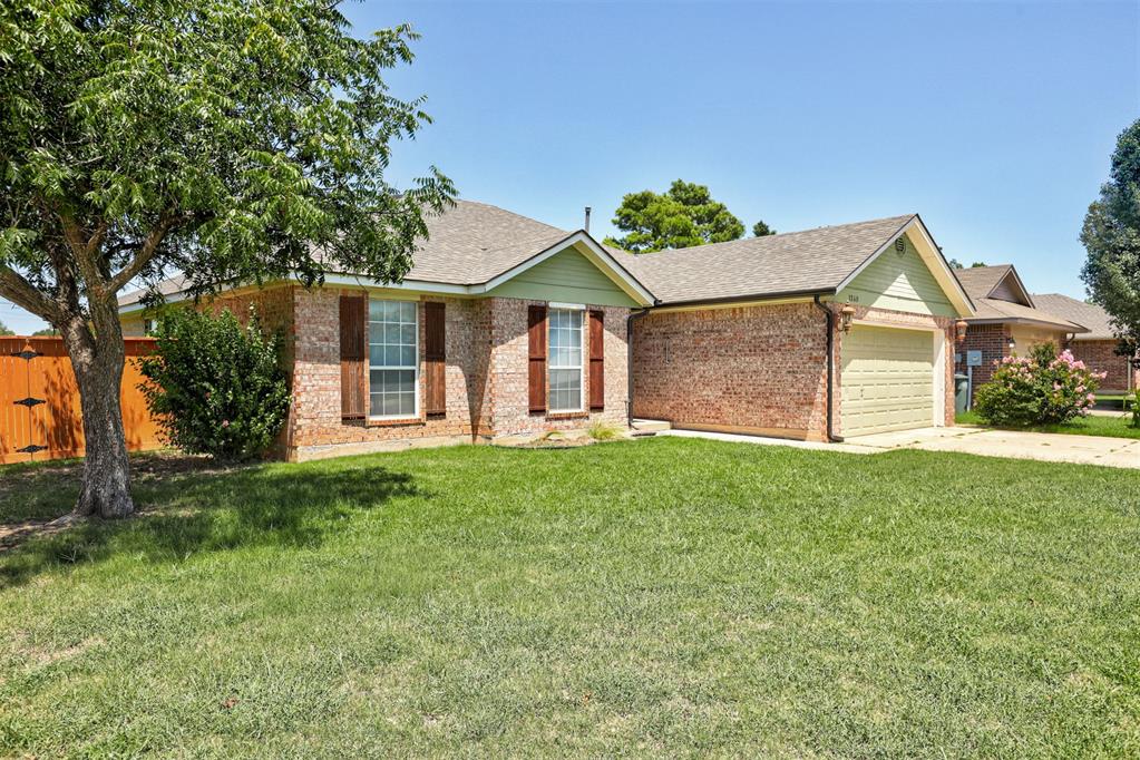 Looking for more than just a place to live? This well-maintained, one-owner home in Bradford Park offers comfortable living, valuable extras, and a standout workshop space.Situated on a corner lot, the home features a brick-front exterior and mature shade tree. Inside, a wall of windows fills the living room with natural light, while the gas fireplace and corner brick hearth create a warm focal point.The kitchen is designed for both everyday use and entertaining, with solid wood cabinetry, generous storage, a gas range, and plenty of counter space. The primary suite includes a pass-through walk-in closet with two entrances, a double vanity, garden tub, and separate walk-in shower. Three bedrooms, two bathrooms, and additional storage complete the interior.Step outside to a covered patio and a custom-built workshop that is insulated, wired for electricity, and equipped with a window air-conditioning unit - ideal for projects, hobbies, storage, or creative space.The property also includes two storm shelters: an above-ground shelter inside the two-car garage and a large traditional storm shelter in the backyard.Conveniently located near Edmond shopping, schools, dining, and area amenities. Come see the space, flexibility, and features that make this Bradford Park home stand out.