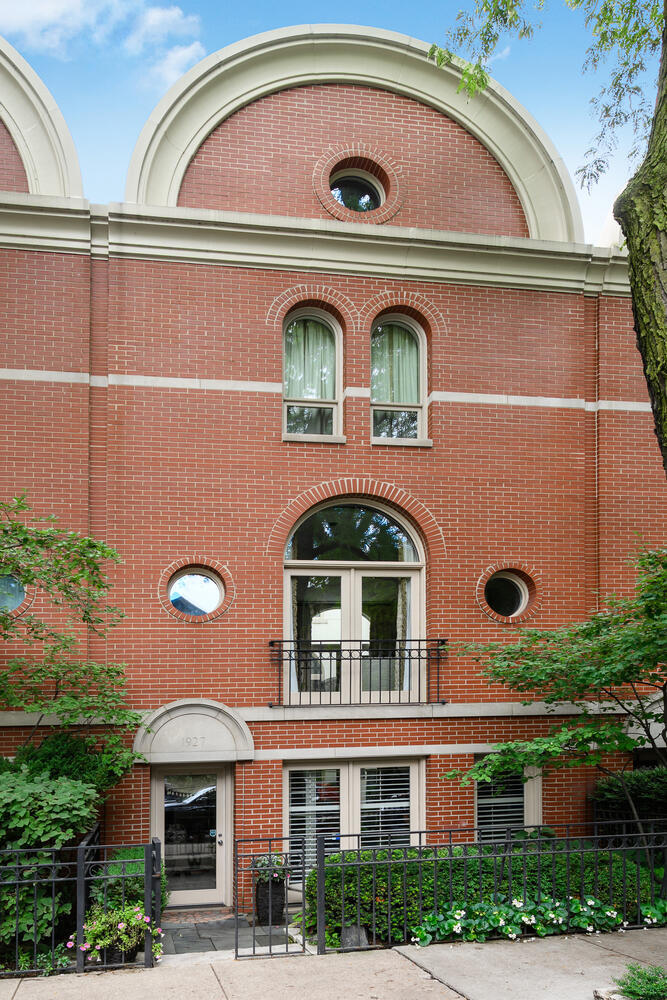 This Italianate style, single family row home was designed and built by Chicago's own very notable architect, Jim Nagle. Featuring a three-story central atrium, bringing in amazing natural light, this home is truly one of a kind. Absolutely prime Lincoln Park block, walking to all of the neighborhood's best offerings at Halsted/Armitage locale and in the Oscar Mayer School district, this home is not to be missed. Three floors above grade, the spacious first floor offers a family room, bedroom, full bath, and a well-appointed wet bar with a wine refrigerator, dishwasher and beverage refrigerator with ice maker.  The home has wine storage for 180 bottles. There is an additional sitting/rec room with wood burning fireplace.  The back yard has a beautifully landscaped garden and patio with a built-in grill, as well as a two-car garage which offers attic storage. The main living level has high ceilings and a gas fireplace. The east facing eat-in kitchen overlooks the garden and offers a 60" Wolf range with double ovens, a commercial grade hood, warming drawer, plus SubZero refrigeration - all situated around an oversized quartzite island and also has an eat-in dining space. The separate dining room with is perfect for entertaining as is the west facing living room that is situated around a stately fireplace and has wonderful western exposure for fantastic natural light. The top level has three gracious bedrooms and two full baths, along with a separate laundry room. The primary suite has amazing vaulted ceilings, a walk-in closet, and a large updated bathroom. The home is heated and cooled by three separate HVAC zones and two water heaters. Every detail in the home has been beautifully curated and offers beautiful details throughout. Steps away from fabulous shopping, dining, coffee shops, bakeries and Oz Park.