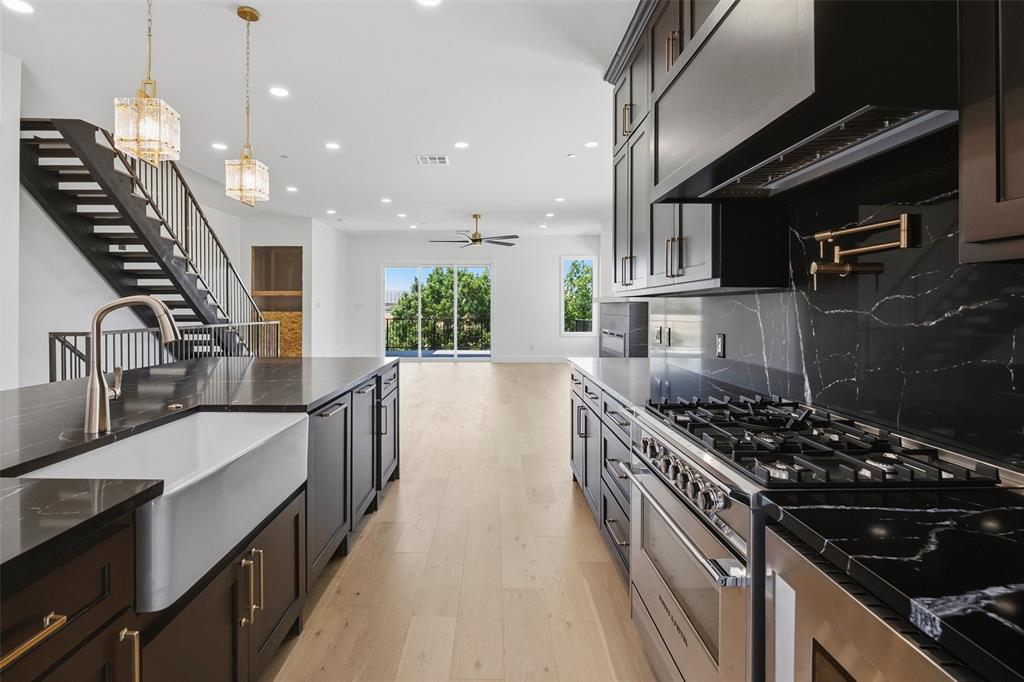 Luxury waterfront living with panoramic views of the Fort Worth skyline and Trinity River. This sophisticated three-story, new-construction townhome offers 3 spacious bedrooms, 3.5 baths and an open-concept floor plan filled with natural light. High-end contemporary finishes and thoughtful design details create a modern, airy feel throughout.The living area features a striking fireplace and walls of windows showcasing the surrounding views. The spacious primary suite offers its own incredible outlook and access to a covered balcony—perfect for morning coffee or enjoying the downtown skyline in the evening.Enjoy an exceptional location with the Trinity Trails right outside your door and convenient access to downtown Fort Worth, Topgolf, dining, breweries and entertainment. A rare opportunity to lease a brand-new luxury townhome combining waterfront living, downtown views and easy access to everything Fort Worth has to offer.