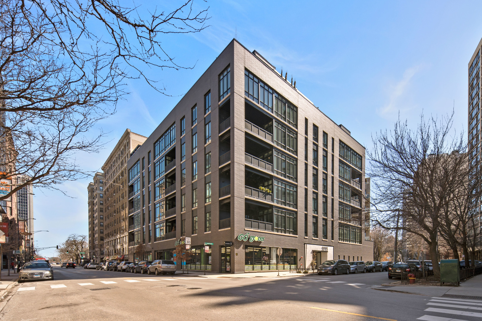 Located in East Lincoln Park, this rare corner 4-bedroom + office/exercise room, 3-bath residence is bathed in natural light and offers beautiful, uninterrupted tree-lined neighborhood views. Unlike other units, this one has no nearby structures blocking its outlook, ensuring outstanding privacy and a true sense of openness.  With over $150,000 in high-end upgrades-from both the original builder and thoughtful, customized additions-this home has been meticulously maintained and is in pristine condition. The expansive layout features high ceilings, floor-to-ceiling windows, and motorized blinds throughout for elevated comfort and control. The chef-inspired kitchen is a true showstopper, featuring a waterfall island, quartz countertops with matching backsplash, elegant Rovere Spazzolato cabinetry, a Sub-Zero refrigerator, Wolf gas cooktop with a vented range hood, Miele dishwasher, and built-in oven and microwave-combining performance with sleek design. A private terrace extends your living space outdoors, ideal for morning coffee, evening wine, or hosting guests. All four main bedrooms offer generous dimensions. The fifth bedroom/flex space is perfect as a home office, gym, TV room, or guest suite-offering the versatility to suit your lifestyle needs. The primary suite comfortably accommodates a king-size bed, seating area, and more. The spa-caliber primary bathroom features radiant heated floors, a soaking tub, walk-in shower, and dual vanities. Radiant heated floors are also included in both additional bathrooms, a rare luxury in the building. Exceptional storage is found throughout the unit, with custom-designed walk-in closets and thoughtfully crafted built-ins. Heated garage parking is included, and an additional space can be added using a lift. Set in a premier location just steps from Diversey Harbor, Lincoln Park Zoo, the Nature Museum, lakefront trails, grocery stores, and top restaurants-this is a home that truly checks every box.