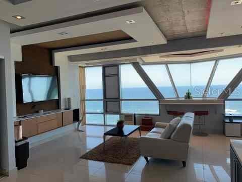 Exclusive Studio at Atlantis Condominium | Steps from Old San JuanLive in one of Puerto Rico's most iconic addresses. This exclusive studio at the Atlantis Condominium sits on Avenida De La Constitución, right in the heart of San Juan and just steps from the cobblestone streets and historic charm of Old San Juan.The showstopper here is a floor-to-ceiling glass wall delivering a private, unobstructed, panoramic ocean view — widely considered one of the best in the entire building.Atlantis is regarded as one of Puerto Rico's premier investment buildings, and it permits short-term rentals (Airbnb) — making this an outstanding opportunity for personal use, rental income, or both.Round-the-clock security, a fully equipped fitness center, backup generator, water cistern, beautifully kept common areas — 5 minutes walking to the beach- Close to Condado, Old San Juan, and San Juan's best dining and nightlife.Whether you're looking for a personal retreat or a turnkey rental investment, this studio offers a rare combination of location, views, and building amenities that's hard to match in San Juan's condo market.