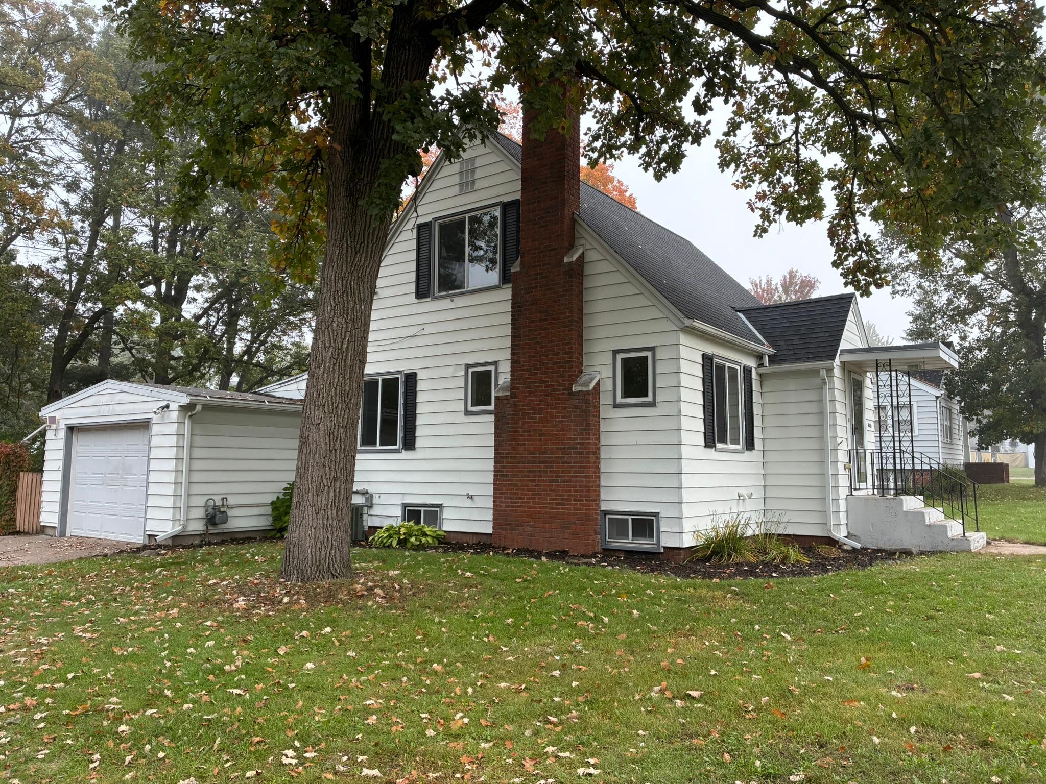 Well cared for home offers beautiful hardwood floors MF & upstairs, fenced backyard, newer furnace & AC, freshly painted, vinyl windows, MF BR w/ 1/2 bath, 3 season room, master bath w/ large walk-in closet, LL family room & updated bathrooms!