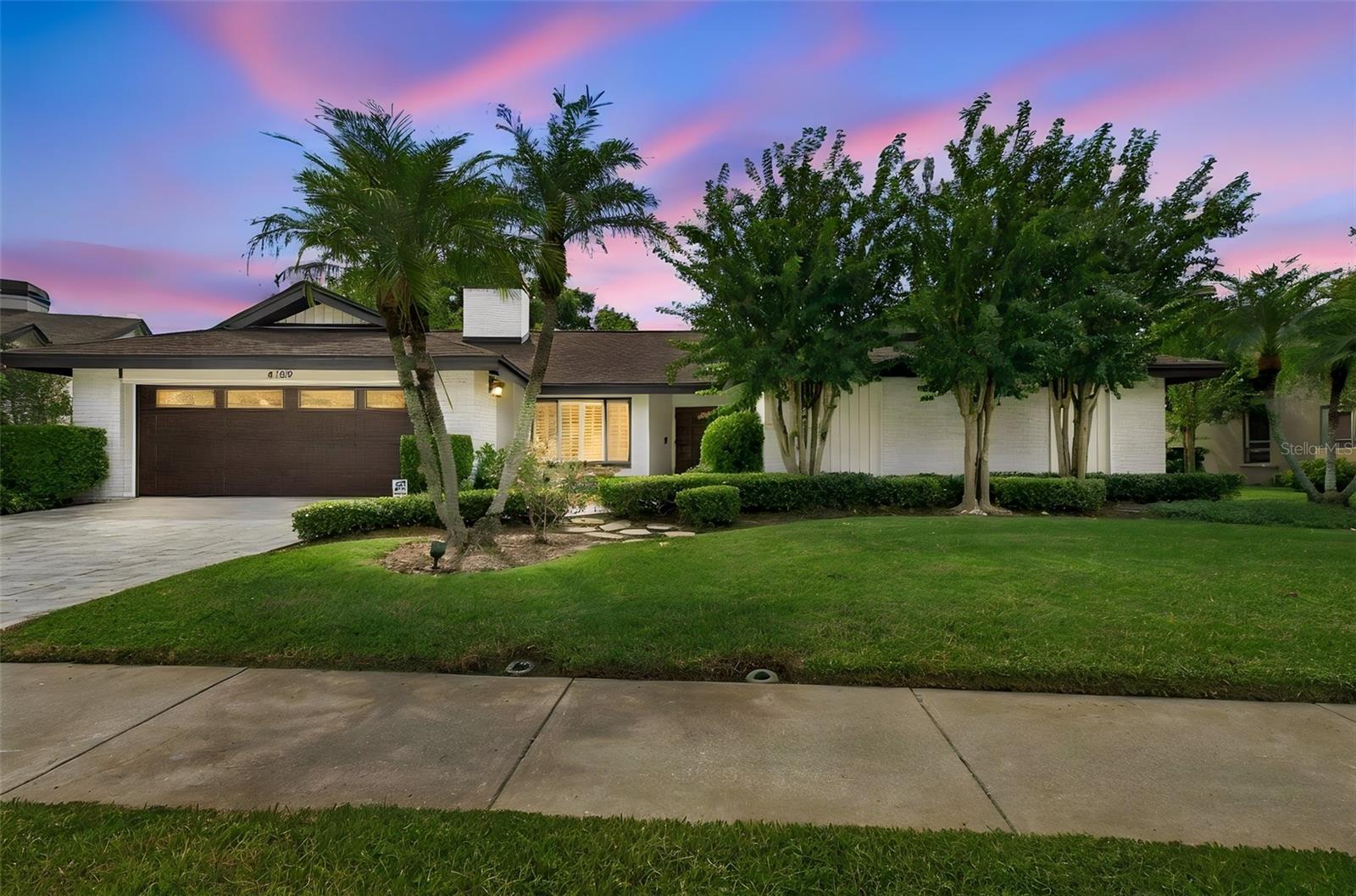 Welcome to Sweetwater at Rocky Point, one of Tampa’s hidden gems! Tucked away in this desirable gated waterfront community, you'll find a beautifully updated 3-bedroom home with a den/office that offers an exceptional combination of location, space, and Florida living. The den has a convenient built-in Murphy bed, providing the flexibility to easily serve as a 4th bedroom or guest room. Designed with entertaining in mind, the home features an inviting open floor plan and a spacious kitchen overlooking the family room and pool area, allowing everyone to stay connected whether you're hosting friends or enjoying a quiet night at home. Recent improvements include a NEW ROOF, new flooring, fresh paint, updated countertops and cabinetry, refreshed pool deck, new landscaping, and fencing. Step outside to your covered lanai and you'll feel like you're at your own private resort! The backyard features low-maintenance artificial turf, a swimming pool, putting green, and wood playset—creating a space with something for everyone while keeping yard maintenance to a minimum. The garage offers additional storage along with a backup refrigerator, adding even more everyday convenience. And the location is hard to beat! Sweetwater at Rocky Point is approximately 4.3 miles from Tampa International Airport, 4.4 miles from International Plaza, and just 1.3 miles from Berkeley Preparatory School, with convenient access to shopping, dining, major roadways, and everything the Tampa Bay area has to offer. If you haven't discovered Sweetwater at Rocky Point yet, this may be the hidden gem you've been waiting for!