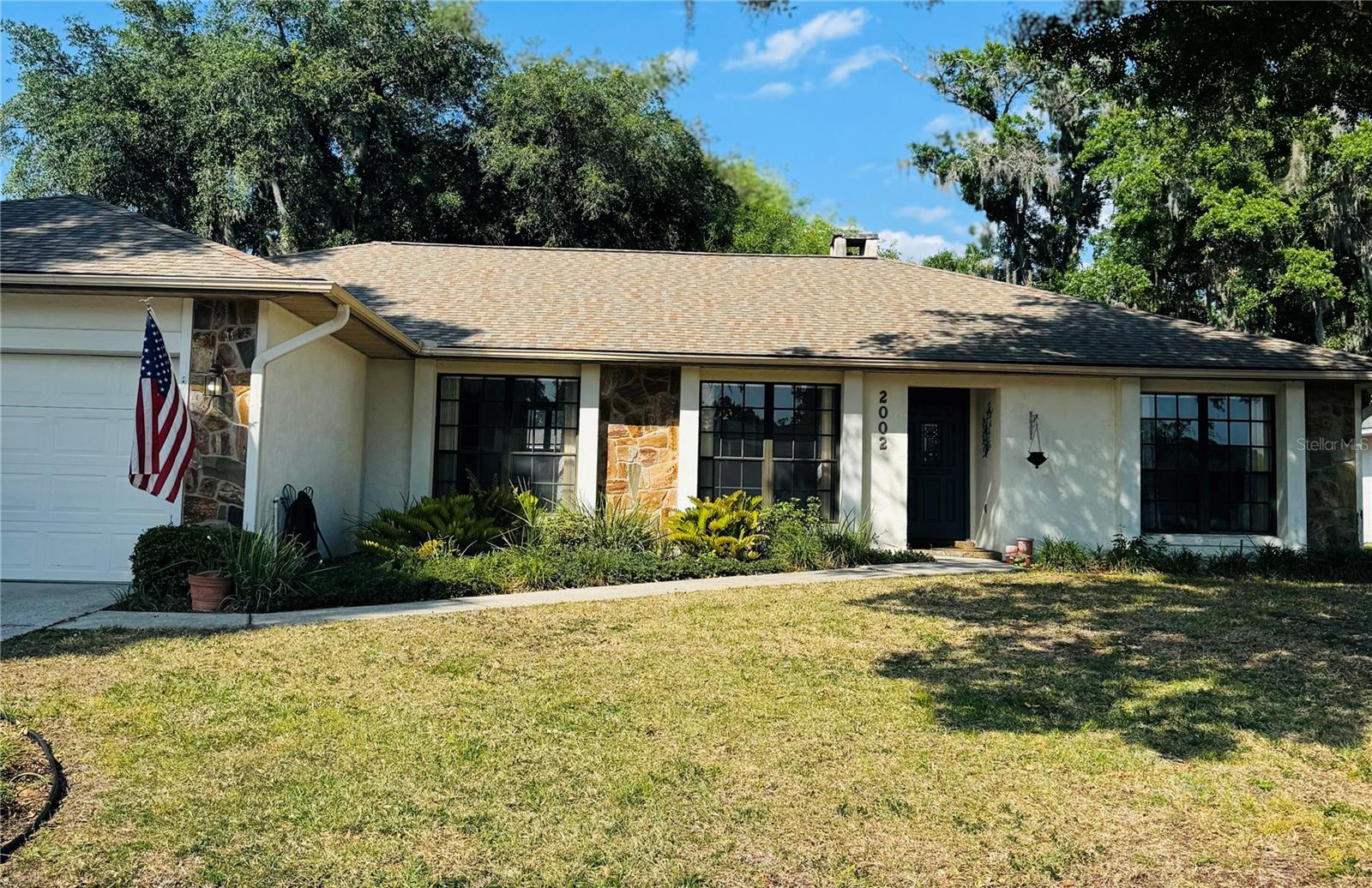 Welcome to the highly desirable Walden Lake subdivision where you will find mature landscaping and low HOA dues.  If you’re looking for spacious split bedrooms, formal living and dining room plus family room with beautiful floor to ceiling stone fireplace & oversized fenced backyard this home will not disappoint.  From the moment you enter this home, you will see a large light and bright living/dining combo which has access to kitchen. The split bedroom floor plan has two bedrooms and one full bath on one end of the home and the primary bedroom with en suite bath on the opposite side providing privacy for all. The en suite bath comes with double vanity sinks, walk in shower and double walk-in closets.  This home has been lovingly maintained and shows pride of ownership throughout with laminate flooring in main living areas for EZ maintenance!  ROOF WAS REPLACED MAY 2022!