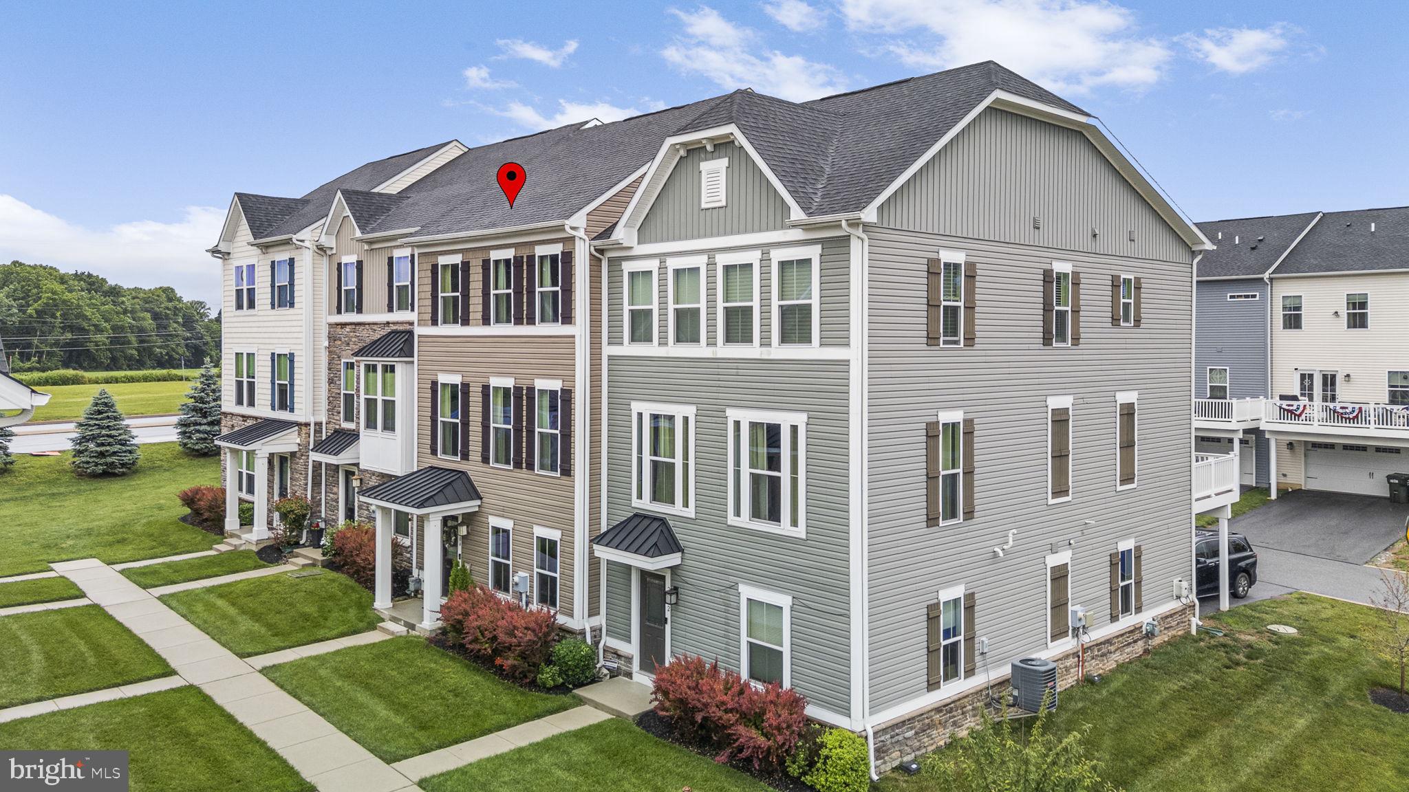 Welcome to 2004 Stargazers Road! Ideally situated in the Stargazer Village and Downingtown School District, this home combines modern finishes, generous room sizes, and low-maintenance living. The main level features an open-concept layout with a spacious living room, luxury vinyl plank flooring, recessed lighting, and abundant natural light. The gourmet kitchen is the heart of the home, showcasing white cabinetry, granite countertops, stainless steel appliances, a large center island with seating, peninsula with breakfast bar and a pantry. The adjoining dining area offers plenty of space for gatherings and provides direct access to the rear Trex deck - the perfect space for outdoor dining, entertaining, or relaxing. Upstairs, the expansive primary suite serves as a private retreat with a tray ceiling, oversized walk-in closet with custom shelving, and en-suite bath featuring dual vanities and a tiled shower. Two additional bedrooms, a full hall bath, and a convenient second-floor laundry area complete the upper level. The finished lower level offers exceptional flexibility with a large family room, half bath, and direct access to the attached two-car garage-ideal for a home office, playroom, or guest space. Offering generous living space, thoughtful design, and modern finishes throughout, this move-in-ready home is perfectly positioned near shopping, dining, recreation, and major commuter routes.