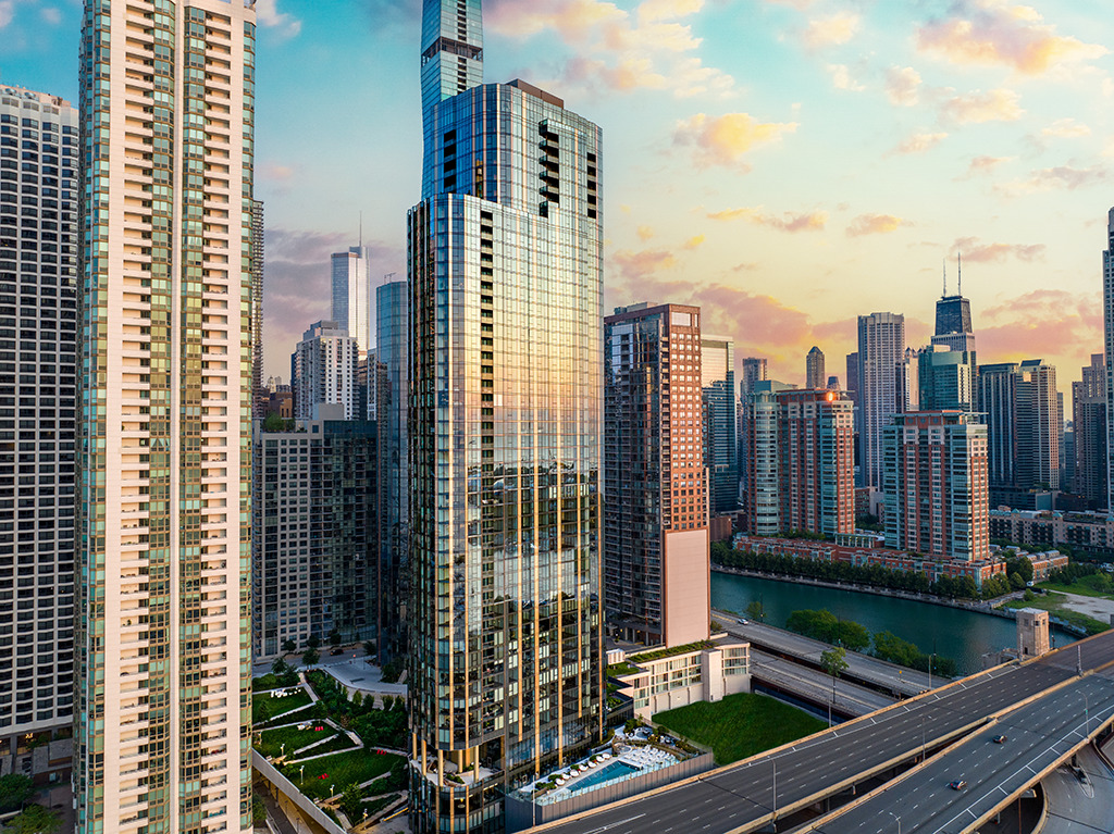 SOLD BEFORE PRINT. Experience luxury resort-style lakefront living at Cirrus in the exclusive Lakeshore East neighborhood with its premier amenities, prime location and private community. Set among Lakeshore East's serene green spaces where the Chicago River meets Lake Michigan, Cirrus offers its residents easy access to the lakefront running and biking path, DuSable Harbor and adjacent neighborhood parks, grocery, restaurants and cafes. Luxury living is made easy with over 48,000 SF of amenities. Entertain on our beautiful 41st floor indoor/outdoor amenity space including a wine lounge, chef's table, catering kitchen, outdoor terrace featuring lawn area, fire pit and grilling stations for al fresco dining - all overlooking the stunning lakefront and skyline. Wellness-minded residents at Cirrus enjoy the fully equipped fitness center including strength studio, motion studio for spinning and yoga with complimentary daily fitness classes, massage suite, steam room, indoor and outdoor pools and hydrotherapy pool. Convenient co-working spaces, salon, kid's club and indoor/outdoor dog runs make daily life easy. The unique lounge spaces, sound-proof jam room, movie screening room, conservatory, pool cabanas, sports simulator and more make life at Cirrus extraordinary. 24-hour door staff and friendly management are committed to making Cirrus a world-class community. Unit 1406 features floor to ceiling windows, wide plank hardwood flooring throughout, custom Italian Snaidero cabinetry, quartz counters, luxury Gaggenau appliances, Dornbracht fixtures and spa-like baths. Indoor parking available.