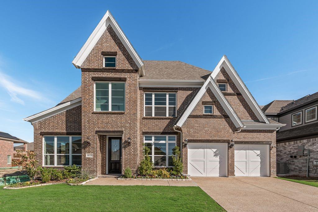 Discover this stunning new construction Grand Home in Monterra, a thoughtfully designed master-planned community offering a swimming pool, splash pad, scenic trails, park, and pickleball courts. Located in the highly acclaimed Rockwall ISD and within walking distance to the pool and pickleball courts, this home combines luxury, comfort, and convenience.The chef’s kitchen is a standout, featuring a spacious island, Shaker-style cabinetry, a full bowl sink, granite slab countertops, stainless steel appliances, a five-burner gas cooktop, large island and a walk-in pantry—perfect for everyday living and entertaining. The open-concept family room is filled with natural light from a wall of energy-efficient windows for lots of natural light and centers around a cozy gas fireplace.Versatile living spaces include a downstairs media room that can also serve as a formal living area or home office. The primary suite is a private retreat with a spa-like bath, complete with a freestanding tub, glass-enclosed tile shower, dual rectangular sinks, and a large walk-in closet. A guest suite is also conveniently located on the main floor.Upstairs offers a spacious game room and a bonus area ideal for a playroom, home gym or second living space. Enjoy outdoor living with a covered back patio, perfect for relaxing or entertaining guests.Additional features include 8-foot interior doors, Energy Star certification with R38 insulation, and a tankless water heater. Situated near Lake Ray Hubbard with easy access to shopping and dining, this home offers the perfect blend of upscale living and suburban charm.