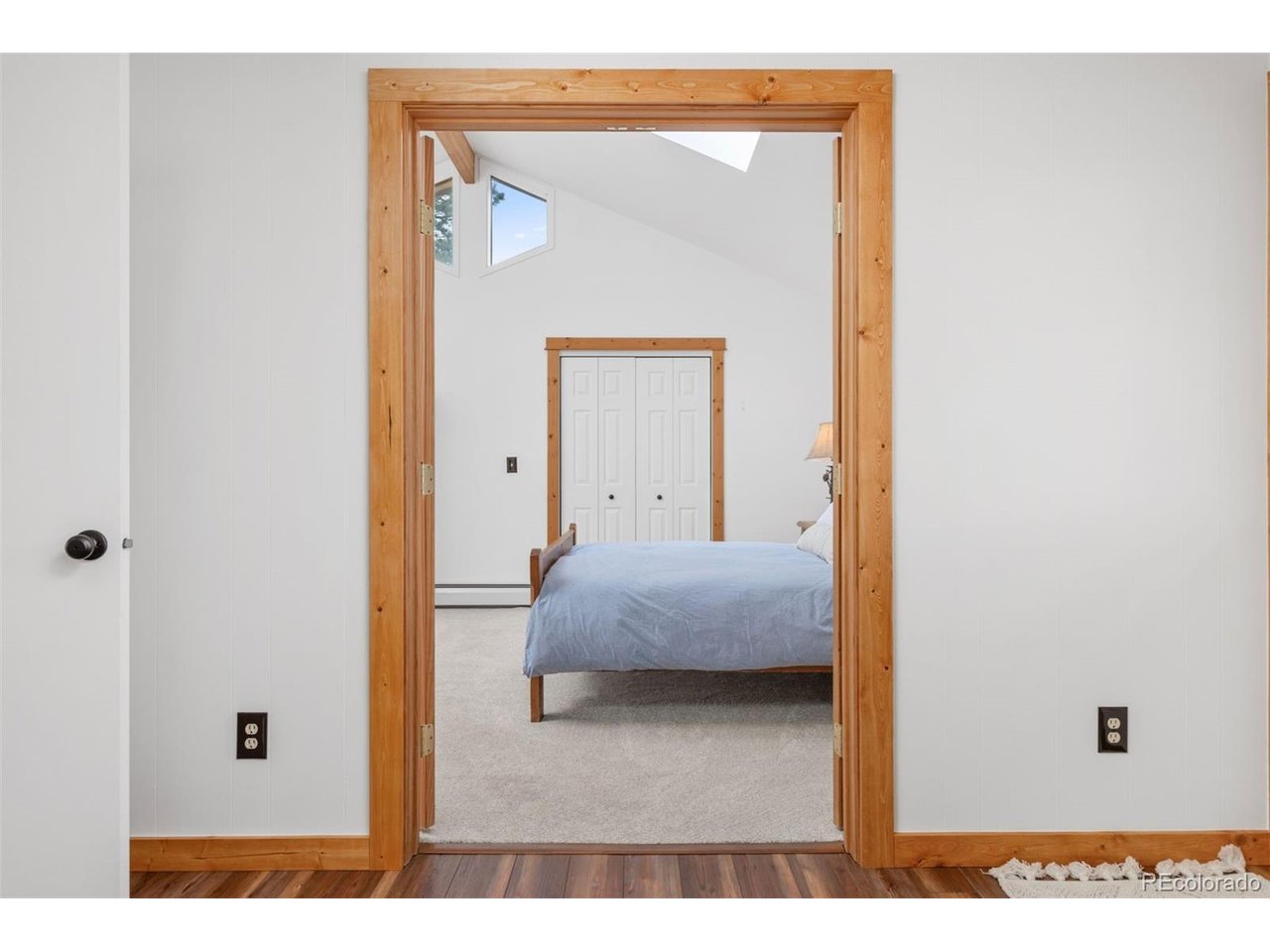 Quite possibley the BEST location in Estes Park- walk to Main Street! This spacious home offers 3 bedrooms, 3 baths with a lower level inlaw suite. The home combines distinctive European-inspired architecture with modern updates and the convenience of in-town living. Turnkey and move-in ready, the home has been thoughtfully refreshed with an updated kitchen, renovated bathrooms including the primary ensuite, new carpet, and new LVP flooring. The lower level offers exceptional flexibility with a full kitchen and the potential to function as a lock-off-ideal for guests, multigenerational living, or potential rental income.Step outside and you're just minutes from Estes Park's restaurants, shops, galleries, coffee shops, and local attractions. Spend the day exploring Rocky Mountain National Park, hiking and biking nearby trails, or strolling along downtown's charming streets, then return to your comfortable mountain home. With its distinctive Bavarian character, updated interiors, flexible floor plan, and unbeatable in-town location, 251 Mountain View Lane is a rare opportunity to own a turnkey home in one of Colorado's most beloved mountain communities.