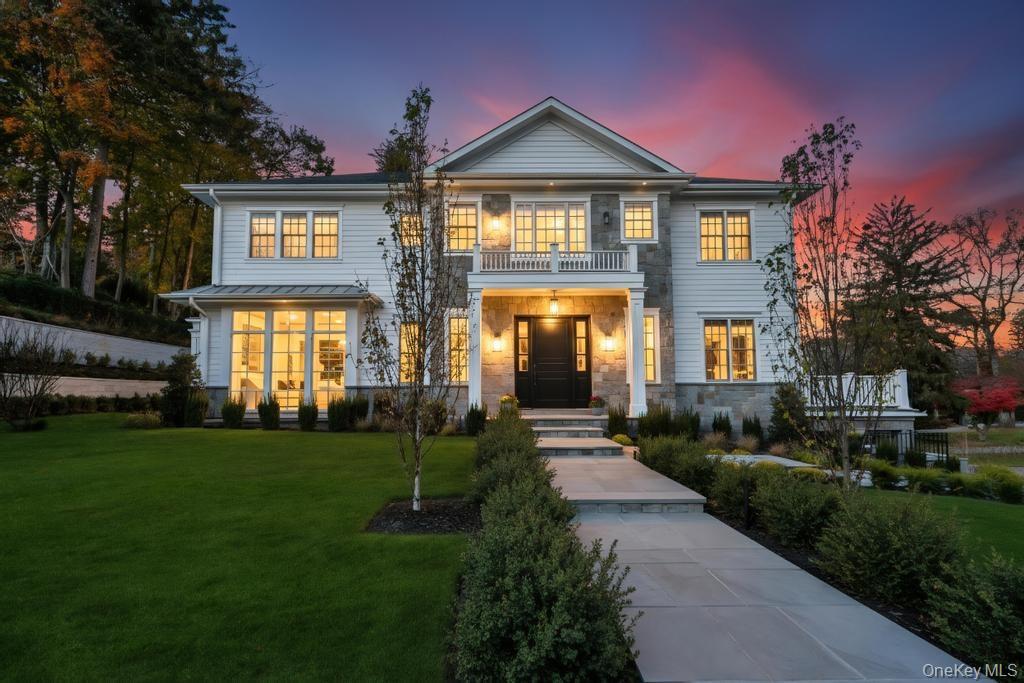 A Striking New Construction In The Heart Of Manhasset! Set On One Of Manhasset’s Most Desirable Streets, This Newly Built South-Facing Residence Offers More Than 6,320 Sq Ft Of Refined Modern Luxury. A Dramatic Double-Height Foyer, Sun-Filled Interiors, And Elegant Architectural Details Set The Tone Throughout. At The Center Of The Home Is A State-Of-The-Art Chef’s Kitchen With Premium Appliances, Custom Cabinetry, And A Large Island, Opening Seamlessly To The Expansive Family Room With Gas Fireplace And Access To The Private Backyard. The Main Level Also Features A Formal Dining Room With Butler’s Pantry, Formal Living Room, Designer Powder Room, And A Full Guest Suite. Upstairs, The Serene Primary Suite Includes A Spa-Inspired Bath, Exceptional Closets, And A Private Balcony. Three Additional En-Suite Bedrooms Plus A Dedicated Laundry Room Complete The Second Floor. The Walk-Out Lower Level Offers Tremendous Versatility With High Ceilings, Abundant Natural Light, A Custom Bar, Full Bath, Bedroom, Second Laundry, Mudroom, And Sprawling Open Space Ideal For A Gym, Theater, Or Recreation Lounge. Additional Amenities Include Full Radiant Heat, An Elevator, Whole-House Generator, Central Vacuum, Multiple Balconies, And A Two-Car Attached Garage—All Minutes From The Manhasset LIRR, Americana Shops, Dining, And The Strathmore Vanderbilt Country Club.