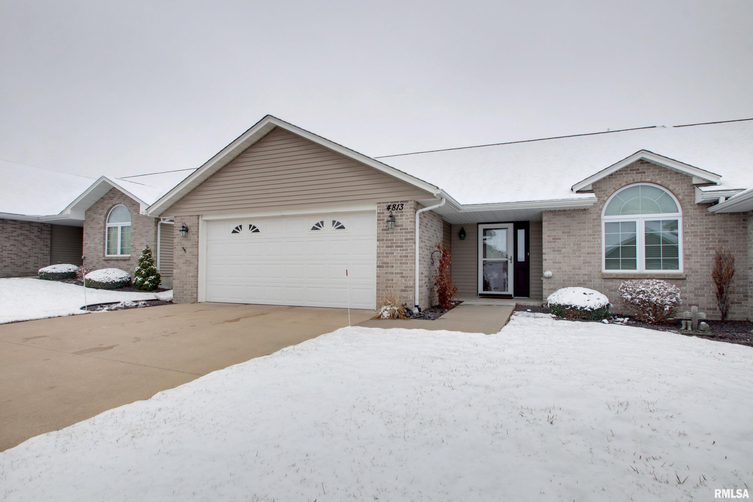 Convenient single level living at its finest with this well maintained cluster home in the Lake Ridge development.  You'll enjoy the open floor plan of this 2 bedroom, 2 bath, 1621 sq ft unit and the bonus features like the gas fireplace and a light and bright sunroom. An entertainers delight with its custom kitchen including a breakfast bar, stainless appliances, and granite countertops and convenient main floor laundry. The spacious primary suite offers a private full bath complete with a walk in shower and generous walk in closet. And of course, you have the 2 car garage for parking and storage needs. The privacy fenced patio is perfect for outdoor relaxation and a great spot to grill. This unit won't last long, so schedule your showing today!