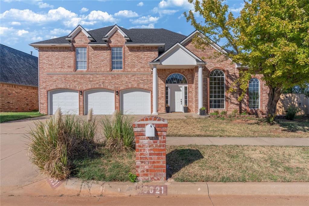 Situated on a spacious corner lot in Edmond, this impressive 4-bedroom, 2.5-bathroom two-story home combines grand architectural scale with effortless functional living. Soaring ceilings create an expansive, open feel upon entry, leading into a light-filled main living area anchored by large arched windows and an elegant fireplace. The functional floor plan includes both a formal dining room near the entrance and an informal dining space off the kitchen, which features abundant storage, extensive prep space, a breakfast bar, built-in appliances, a large window over the sink, and a nearby walk-in storage closet ideal for a massive pantry. The main-floor primary suite serves as a luxurious retreat, showcasing a spa-like en-suite bath centered around a freestanding soaker tub, custom tile work, and an expansive walk-in shower equipped with dual rainfall showerheads. Upstairs, a broad landing opens to generous secondary bedrooms and a dedicated walk-in storage closet. Completing the property is a fully fenced backyard with a covered patio, along with a 3-car garage featuring an in-ground storm shelter for ultimate safety. Reach out today to schedule your private tour!
