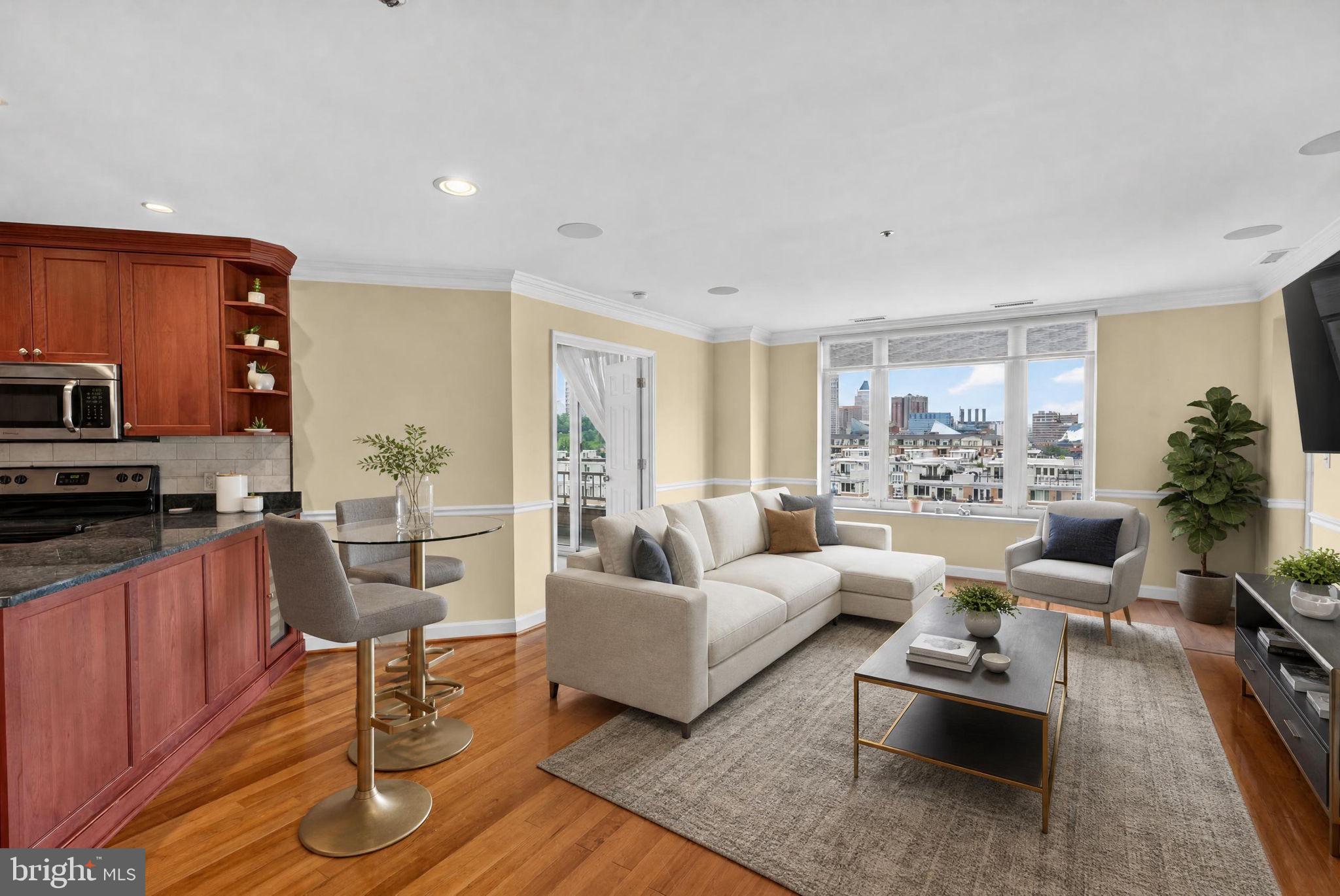 MAJOR PRICE DROP!! Where city living meets a year-round vacation lifestyle, you don’t want to miss out on this amazing condo! Enjoy stunning waterfront views of the Baltimore Inner Harbor and city skyline from this beautifully laid-out 2-bedroom, 1.5-bathroom home, featuring two private balconies. Thoughtfully renovated in 2018, this unit offers an updated kitchen with tons of storage, stainless-steel appliances, a wine fridge, and a breakfast bar. The living room is open and inviting, with beautiful hardwood flooring and continued views of the Inner Harbor. The primary bedroom has direct access to the first balcony and features a walk-in closet, ensuite bathroom with a jetted soaking tub, walk-in shower, and double vanity. A convenient half bathroom is located off the hallway, perfect for guests. The spacious second bedroom also offers access to the second balcony. A custom built-in surround sound system runs throughout the entire unit, with speakers in every room, including the primary bathroom—adding a touch of luxury and music to your everyday life. But this luxury lifestyle extends well beyond your front door—let’s talk amenities! This full-service waterfront community offers 24/7 security and doorman/concierge services, along with gated garage access to two deeded parking spaces and complimentary valet services for residents and their guests. Two guest suites are available to rent, giving your friends and family their own privacy when visiting. Don’t miss a gym session with the building’s huge 24-hour, 4,000-square-foot, fully equipped health and fitness center, complete with a dedicated yoga room, steam room, sauna, hot tub, and massage facility to enjoy after your workout. The building also features a 50-foot indoor heated lap pool, children’s wading pool, and outdoor community pool—perfect for catching those summer rays. Make working from home easier than ever with professional meeting and conference rooms and a business center. Having an event? The ballroom is available to rent! The common areas are designed for relaxing and entertaining, with Wi-Fi, a cozy fireplace, TV, bar, and pool table. Building maintenance handles trash collection, with convenient trash chutes located on every floor. Water bill is included in the association fees. The building offers six elevators, with three located on each wing. Have a fur-baby? This is a pet-friendly building! Worried about storage? Don’t be! This unit comes with its own dedicated storage unit. Step outside and you have immediate access to the waterfront promenade, perfect for morning walks, runs, bike rides, or an easy stroll to the Inner Harbor. Located just one block from Tabrizi’s and Di Pasquale’s Italian restaurant, with easy access to downtown Baltimore and I-95. Come experience waterfront city living where everyday can feel like a vacation!