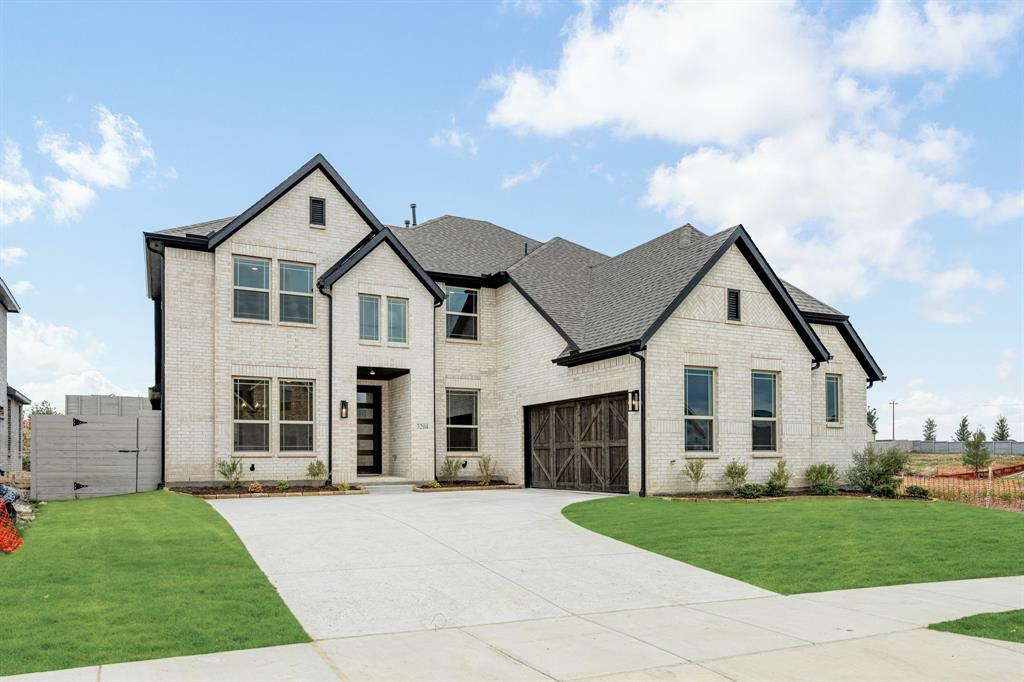 NEW! NEVER LIVED IN. Complete NOW! This stunning Bloomfield Seaberry II perfectly blends luxury and functionality, featuring 4 bedrooms and 4 baths with a striking facade of upgraded brick, cedar garage doors, a charming bricked front porch, and a swing-style garage that enhances curb appeal. Enter through the impressive 8' 5-Lite Front Door into an elegant main level where engineered wood flooring flows through the common areas, complemented by soaring vaulted ceilings, 8' interior doors downstairs, and elegant uplights that highlight the home’s refined architectural details. The expansive Family Room is anchored by a dramatic stacked Stone-to-Ceiling Fireplace, while a wrought iron railing in lieu of a half wall opens the view to the upstairs Game Room and creates a sense of airy continuity. A private Study with Glass French Doors offers a serene work-from-home space, and the Deluxe Kitchen impresses with Pure White Cabinets, undercabinet lighting, pendant lights, a trash pull-out, Quartz countertops, a White Farm Sink, and all-gas stainless steel appliances. The thoughtfully designed first floor includes two bedrooms—one of which has its own full bath—while the tranquil Primary Suite features a spa-like retreat with an enlarged glass-enclosed shower, garden tub, L-shaped dual vanity, and large walk-in closet. Full oak stairs with a horizontal railing lead to the second floor where two more bedrooms and a spacious Game Room share the level with a Media Room pre-wired for 7.1 Surround Sound and Bath 4, which includes a walk-in shower. Additional conveniences include a mud room with utility cabinets, gutters, exterior lighting, a gas drop on the patio for grilling, and an energy-efficient tankless gas water heater. Nestled on a desirable interior lot, this home also offers access to exceptional community amenities like a pool, playground, clubhouse, fishing, and more. Visit Bloomfield at Painted Tree to experience this remarkable home today!