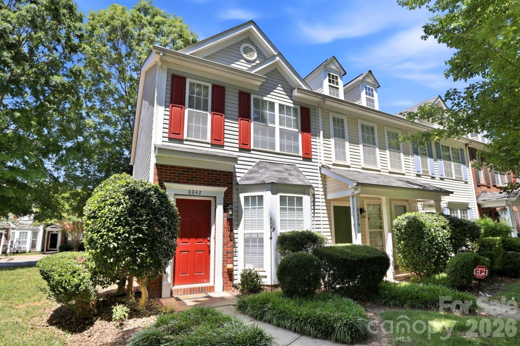 INCREDIBLE VALUE IN CHARLOTTE! Don't miss this opportunity to own a beautiful end-unit townhome priced at just $255,000! Featuring two spacious primary suites, each with its own private en-suite bathroom, this home offers the perfect layout for roommates, guests, or flexible living. The bright, upgraded kitchen is filled with natural light and features French doors leading to a private patio—ideal for morning coffee, relaxing evenings, or entertaining friends and family. Enjoy the warmth and charm of the double-sided corner fireplace, visible from both the dining area and living space, along with a large bay window that fills the den with natural light. Additional features include a convenient second-floor laundry area and low-maintenance living with HOA dues covering water and trash service. Location is everything! Ideally situated just minutes from I-485, Charlotte Douglas International Airport, shopping, dining, and Uptown Charlotte, making commuting and everyday living incredibly convenient.