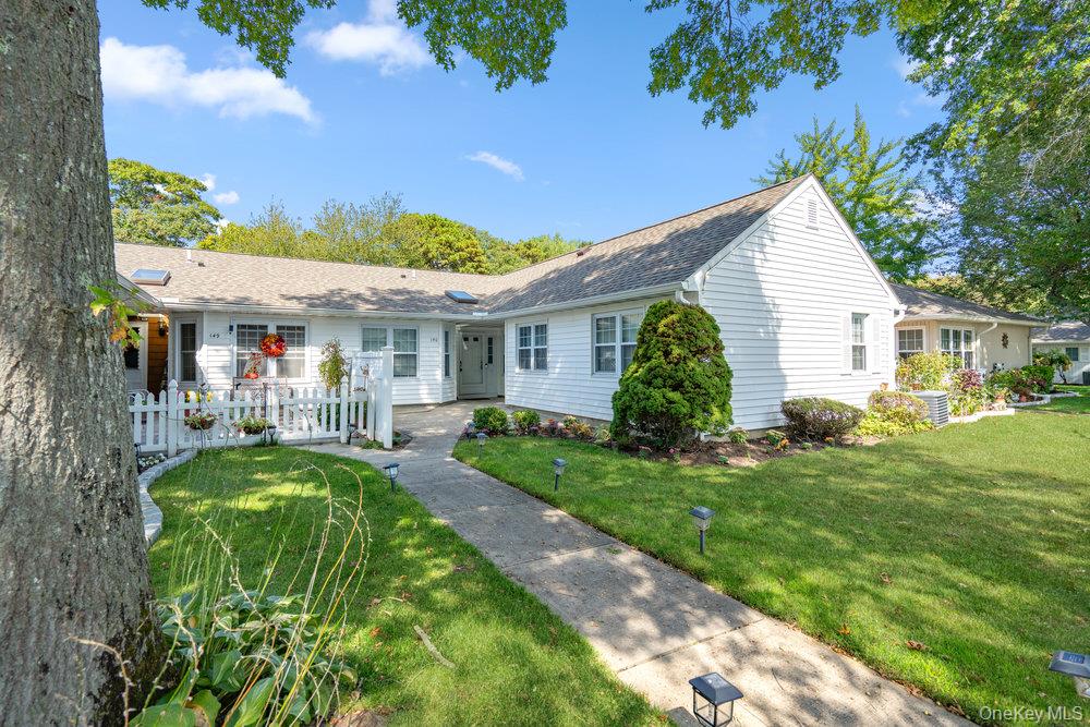 Welcome to this beautifully updated, move in ready condo in the  sought after 55+ community Sunrise Village! Located in an ideal spot, this freshly painted 2 bedroom, one and a half bath unit boasts a newly renovated kitchen with beautiful wood cabinets and stainless steel appliances, perfect for cooking and entertaining. The home features updated roof, windows and washer/dryer. Cac, separate mud room, attic and carpet through out. This condo offers a one car garage with electric door opener. Private outside patio for your enjoyment.The community offers  a club house, heated pool, gym and library area. Active community with access to a jitney bus for your transportation needs. Close to public transportation, major roadways, railroad, shopping, restaurants and ferries to Fire Island. There is 24/7 gated security. If your ready for a lifestyle change, this is it!