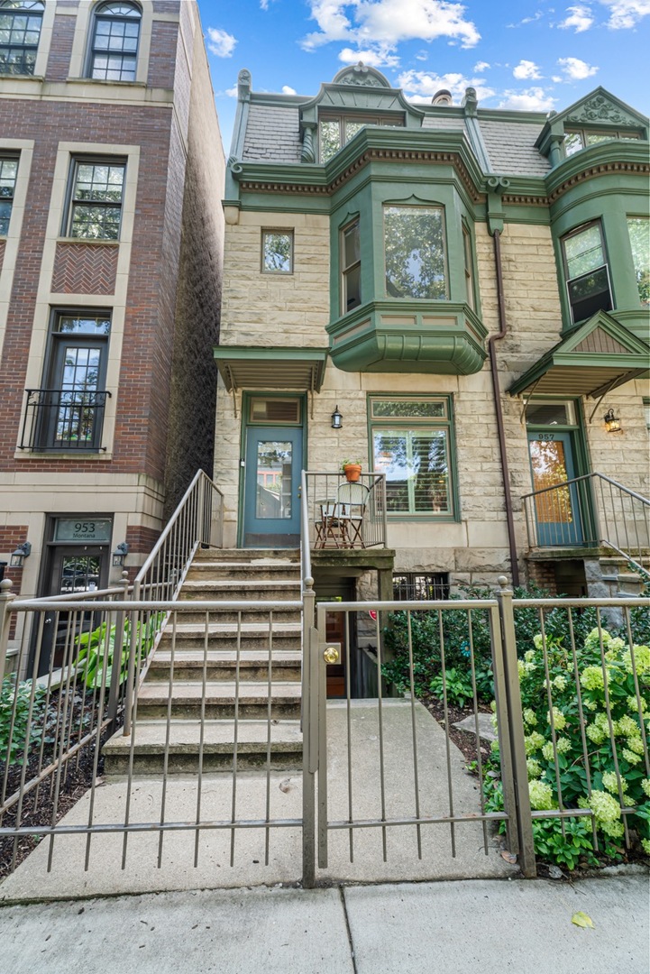 Unique Duplex unit on one of Lincoln Park's most beautiful tree-lined blocks!  Lives like a single family home with two private entrances and two levels of living space.  This pristine unit is so well finished you'll fall in love instantly! Like living in a magazine.  This gorgeous home features hardwood floors throughout, formal living space with room for dining, brand new open kitchen with white cabinets, quartz, and custom backsplash, stainless appliances & breakfast bar.  Wonderful floor plan with each of the oversized bedrooms on their own level and both with their own baths and large walk-in closets. Primary bathroom has been graciously updated with spa-like finishes. Private back deck with room to relax and grill.  Very spacious walk-out family room with fireplace and wet bar and adjoining den/office area.  Huge 10FTx8FT private storage room and more closets than you'd ever need. All this in an A+ location just blocks from the very best shops, restaurants & nightlife Lincoln Park has to offer including the Whole Foods just one block away.  Garage parking included in the price.