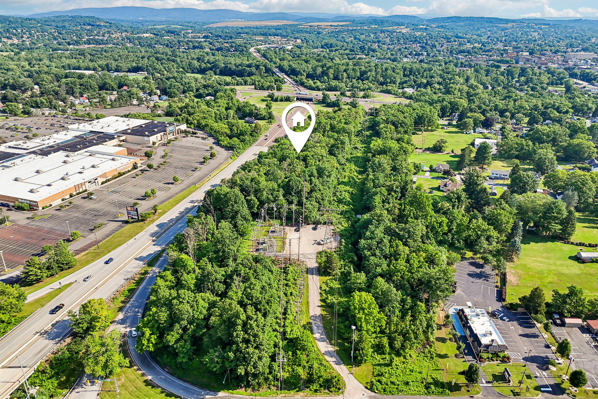 Exceptional 16.73-acre development opportunity in the heart of rapidly growing North Coventry Township. Ideally positioned at the prominent intersection of Route 100 and Route 724, this strategically located property offers outstanding frontage, excellent accessibility, and exceptional visibility. Public water and public sewer are available.Situated within the TC-1 Town Center District with the Highway Interchange Overlay, the site presents a unique opportunity for a variety of potential commercial, retail, mixed-use, or residential uses, subject to township approvals. The property consists of six included tax parcels, and previous site engineering studies are available to the buyer.Surrounded by established retail, residential, and commercial development, and located just minutes from Route 422, this highly desirable corner location is well positioned to benefit from the continued growth of the area. The owner is open to creative purchase structures and partnership opportunities.Whether you’re a developer, investor, or end user, this is a rare opportunity to acquire one of the last large, high-visibility development sites in northern Chester County. Buyer is responsible for conducting their own due diligence regarding zoning, permitted uses, and development approvals.