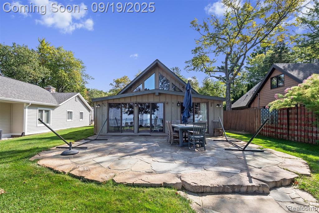 **Lake Living at Its Finest! ** Welcome to your dream home on the most desirable beachfront strip in Caseville! This charming residence boasts 6 spacious bedrooms and 3 full baths, providing nearly 3,000 square feet of exquisite living space. With 50 feet of pristine sandy beach, you can bask in breathtaking sunsets and soak up the summer sun on the recently renovated grounds. When it comes to convenience and amenities, this home has it all—perfect whether you're enjoying quality time with family or hosting gatherings with friends. The property features ample parking, accommodating 7+ cars with a convenient circle drive. You’ll love the expansive hardscape, ideal for hosting outdoor events, all set within lush, meticulously maintained grounds that lead directly to your picture-perfect beach. Located just minutes from downtown Caseville, this home is a private retreat, yet close to all the local attractions. As you enter, you are immediately captivated by the stunning views of the lake through floor-to-ceiling windows, flooding the space with natural light. The main floor includes an expansive kitchen, a cozy eat-in breakfast nook, laundry facilities, an impressive 2-story family room, and a large four-seasons room with expansive door walls, perfect for year-round enjoyment. Venture to the second level via the elegant spiral staircase, where you’ll find an additional 3 bedrooms, a bunk room, and 2 full baths, providing ample space for family and guests. This spectacular home offers incredible potential for both personal use and rental income. Don’t miss your chance to own a slice of paradise in Caseville. Welcome Home!